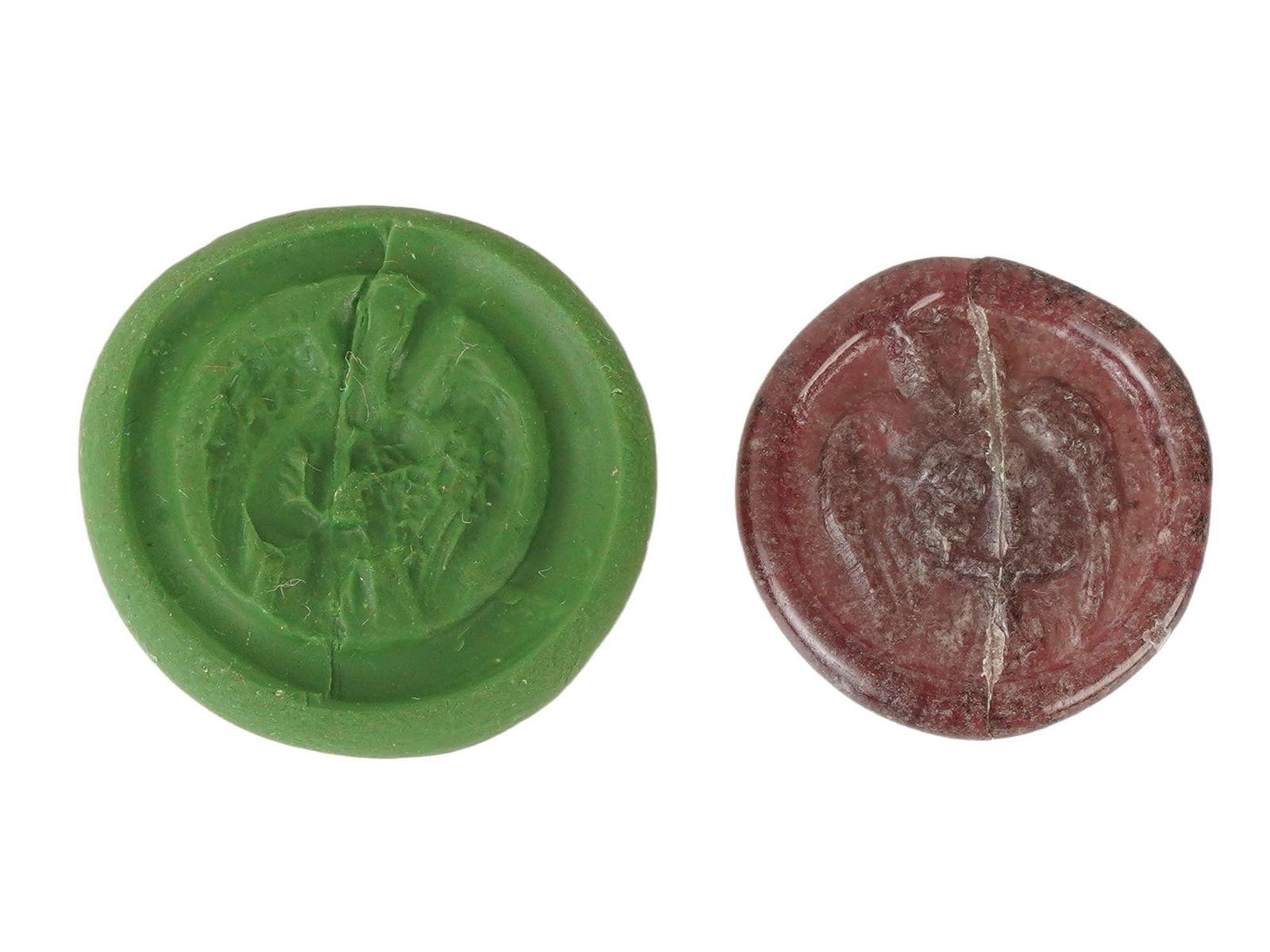 ANCIENT ROMAN GLASS MEDALLION W IMAGE OF LEDA AND SWAN: An ancient Roman glass medallion, dating from 100 to 300 AD. Features a carved image of the mythological scene of Leda and the Swan. The medallion showcases the artistry of Roman glassmakers, combinin