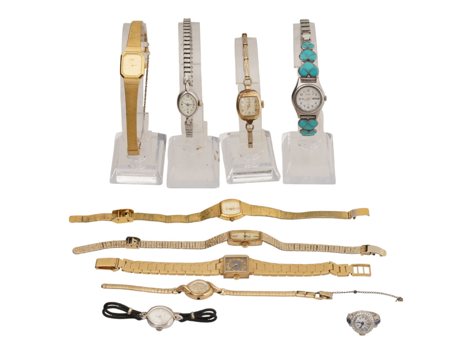 COLLECTION OF ASSORTED LADIES 10K GOLD WRIST WATCHES: A collection of vintage womens wristwatches of various brands and styles, including both mechanical and quartz models. The collection includes a 10K Gold Hamilton wrist watch, Elgin, Bulova, and other