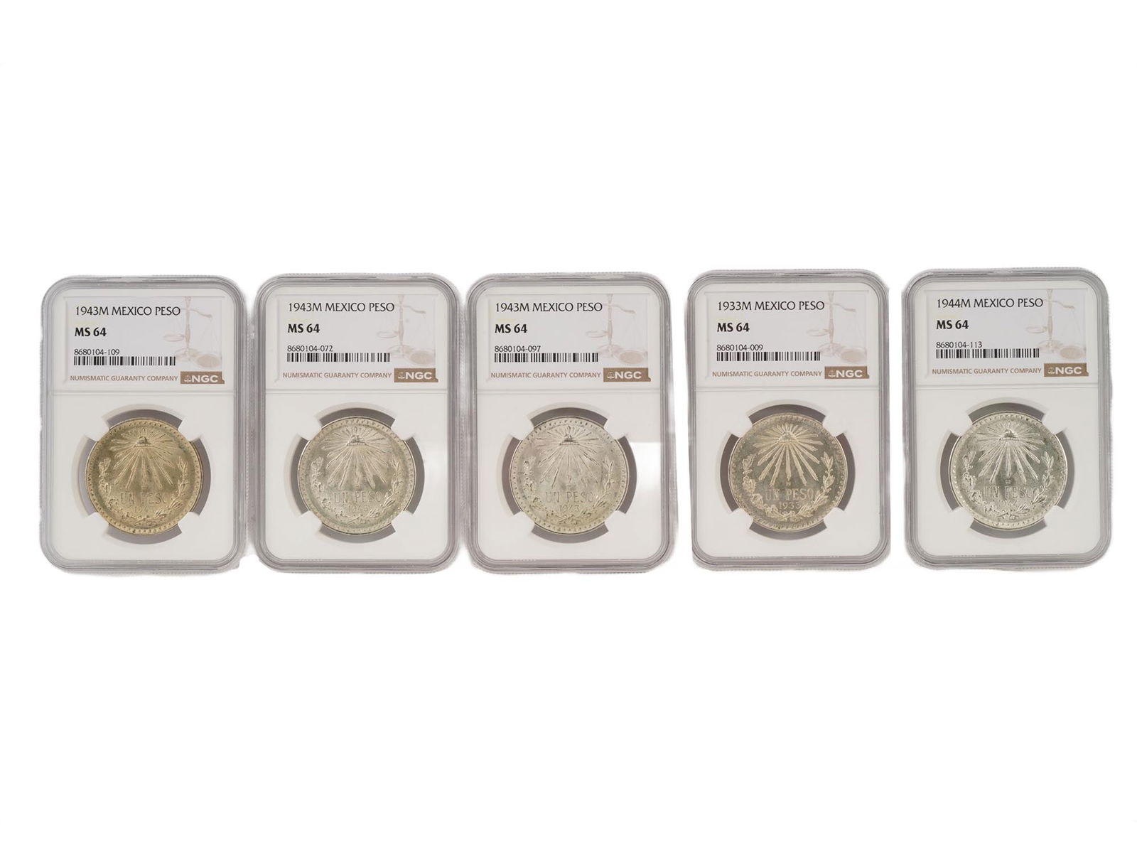 GROUP OF MEXICAN SILVER CAP AND RAYS PESO COINS (1 of 4)