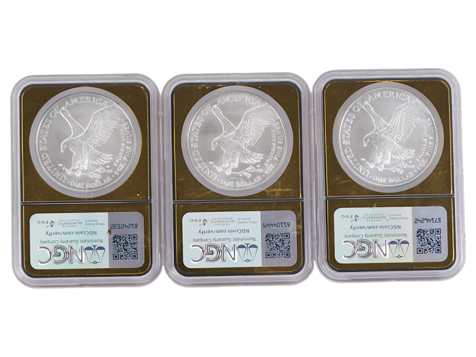THREE GRADED AMERICAN SILVER EAGLE DOLLAR COINS - 3