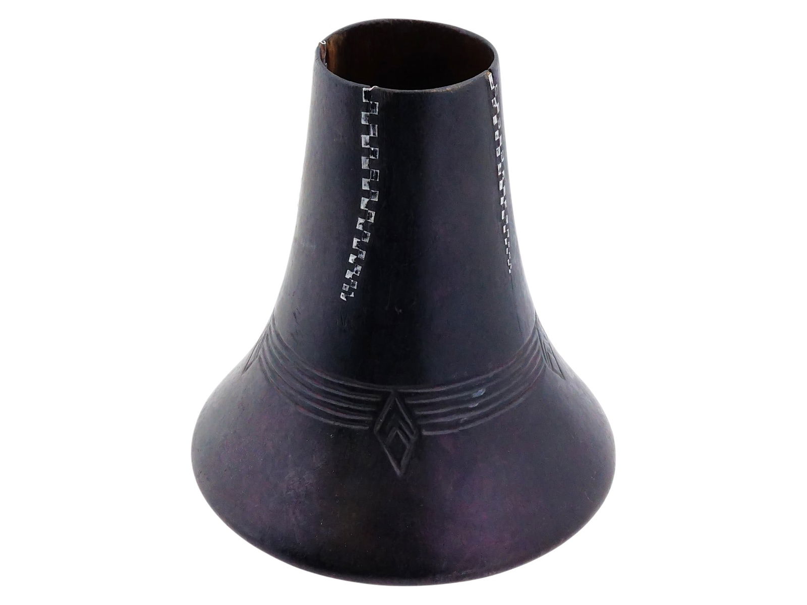 VTG AFRICAN CARVED WOOD INLAID W METAL HIMA MILK JUG: A vintage African carved wood inlaid with metal Hima milk jug. A truncated conical pitcher with a wide, rounded bottom, painted black. Decorated with a striped geometric pattern and inlaid with metal