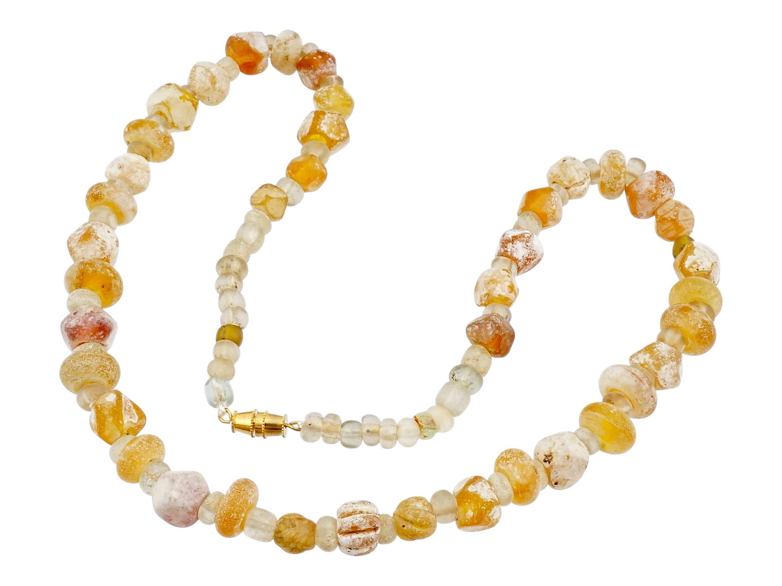 ANCIENT ROMAN GLASS BEAD NECKLACE: An ancient Roman glass bead necklace. Such jewelry reflects the widespread popularity of glass ornaments across the Roman Empire, where glass was often used to imitate more expensive semi-precious sto