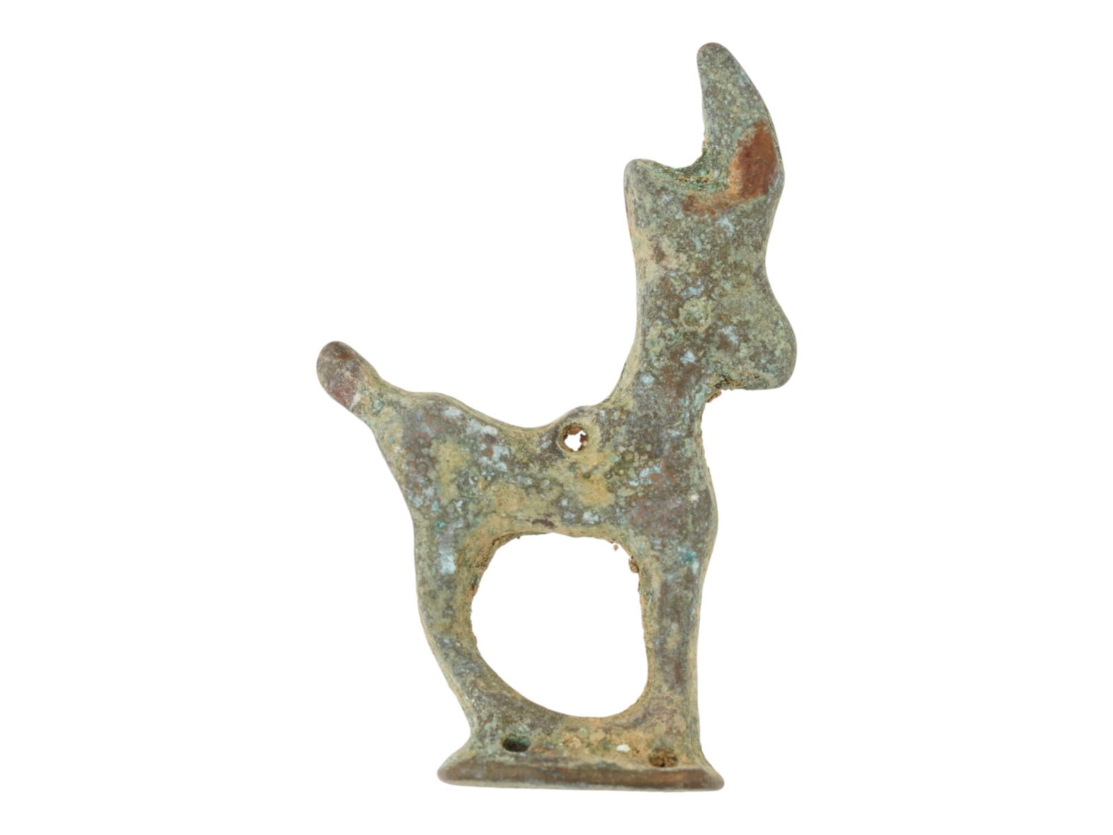 ANCIENT LURISTAN CULTURE BRONZE DEER AMULET: An ancient Luristan bronze deer amulet dating to circa 700 to 500 BC, originating from the mountainous regions of western Iran and characteristic of the distinctive metalwork of the Luristan culture.