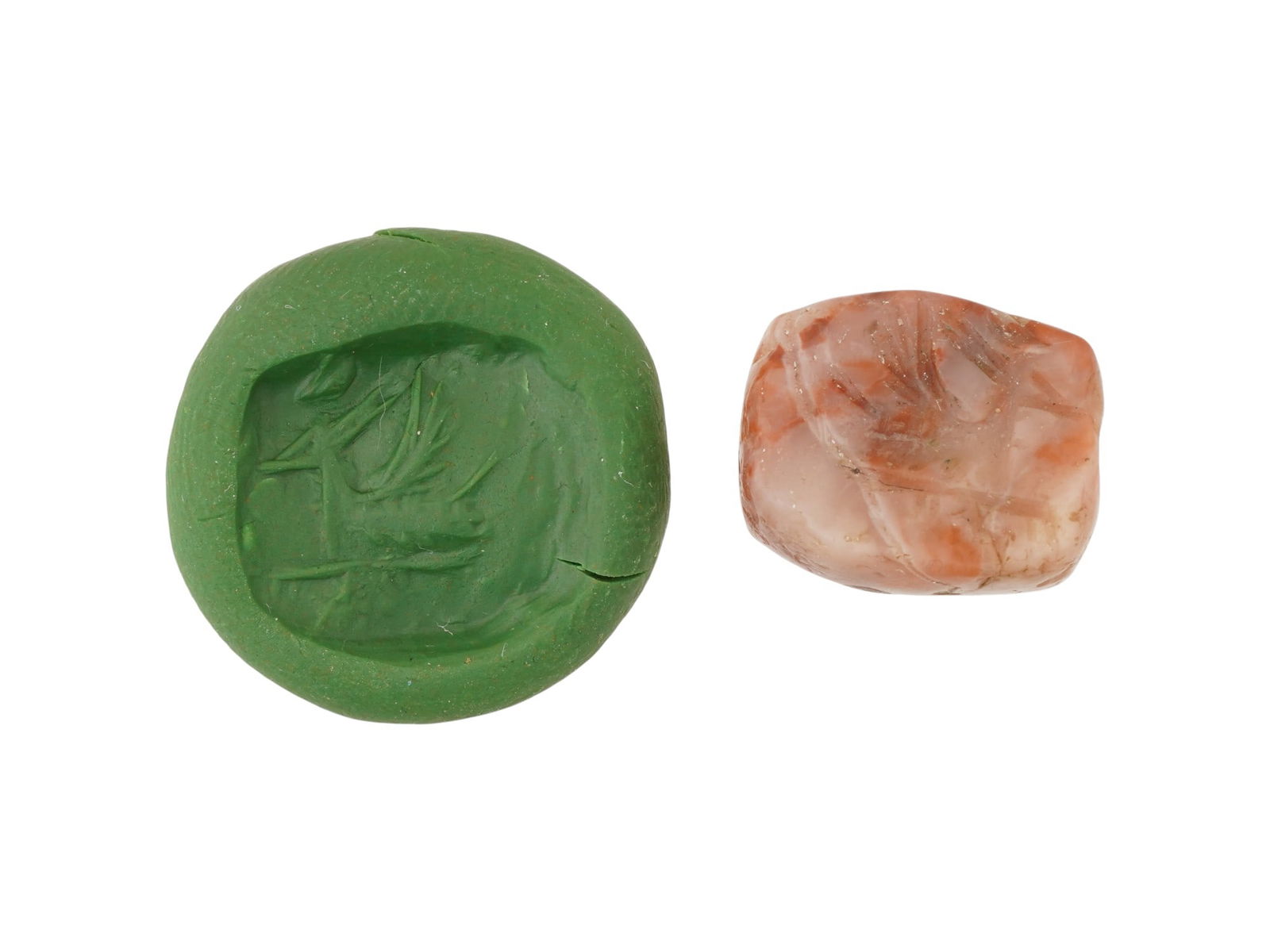 ANCIENT WEST ASIATIC AGATE SCARAB 1ST MILLENNIUM BC: An ancient Western Asiatic carved Agate stone scarab bead seal. The piece is adorned with an impressed mythological image. Pierced through the center. Circa the 1st millennium BC. Collectible Historic