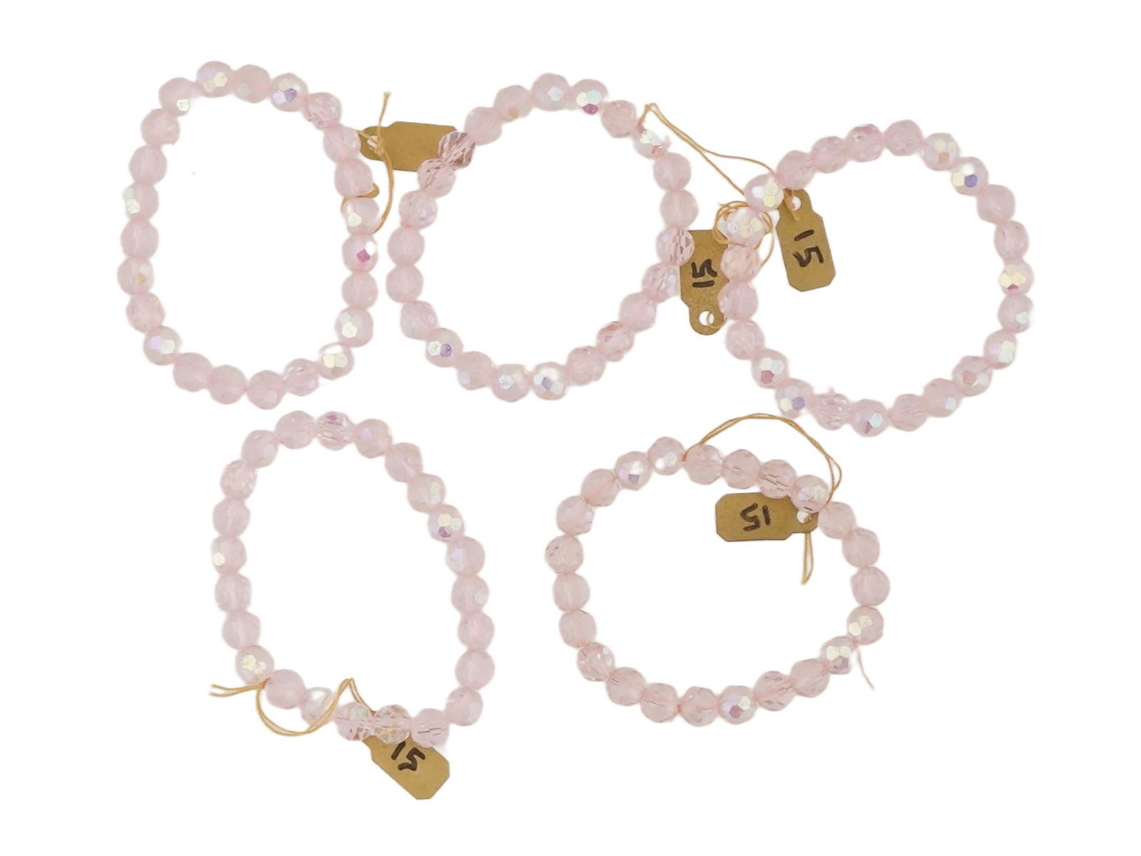 LOT OF VINTAGE GLASS BEADED BRACELETS: A lot of 5 glass beaded bracelets. Faceted round beads of transparent pink color. Vintage Jewelry And Accessories For Women. THIS LOT IS ELIGIBLE FOR A 30-DAY UNCONDITIONAL RETURN FROM THE DATE OF