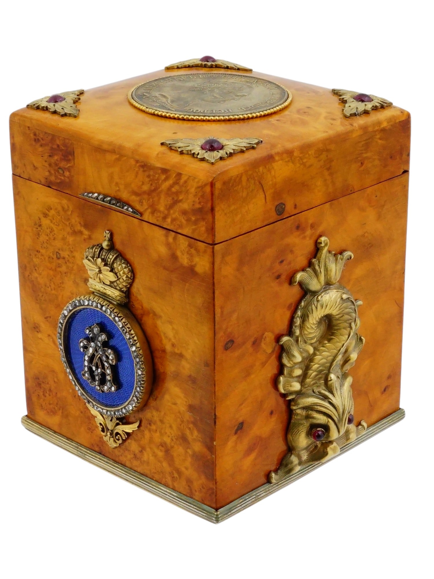 RUSSIAN KARELIAN BIRCH TEA BOX W SILVER ENAMEL DIAMONDS: A Russian Royal Karelian birch silver and enamel tea caddy box with diamonds. The box is heavily embellished with gilt silver overlay decors. The front face features an imperial monogram set within a