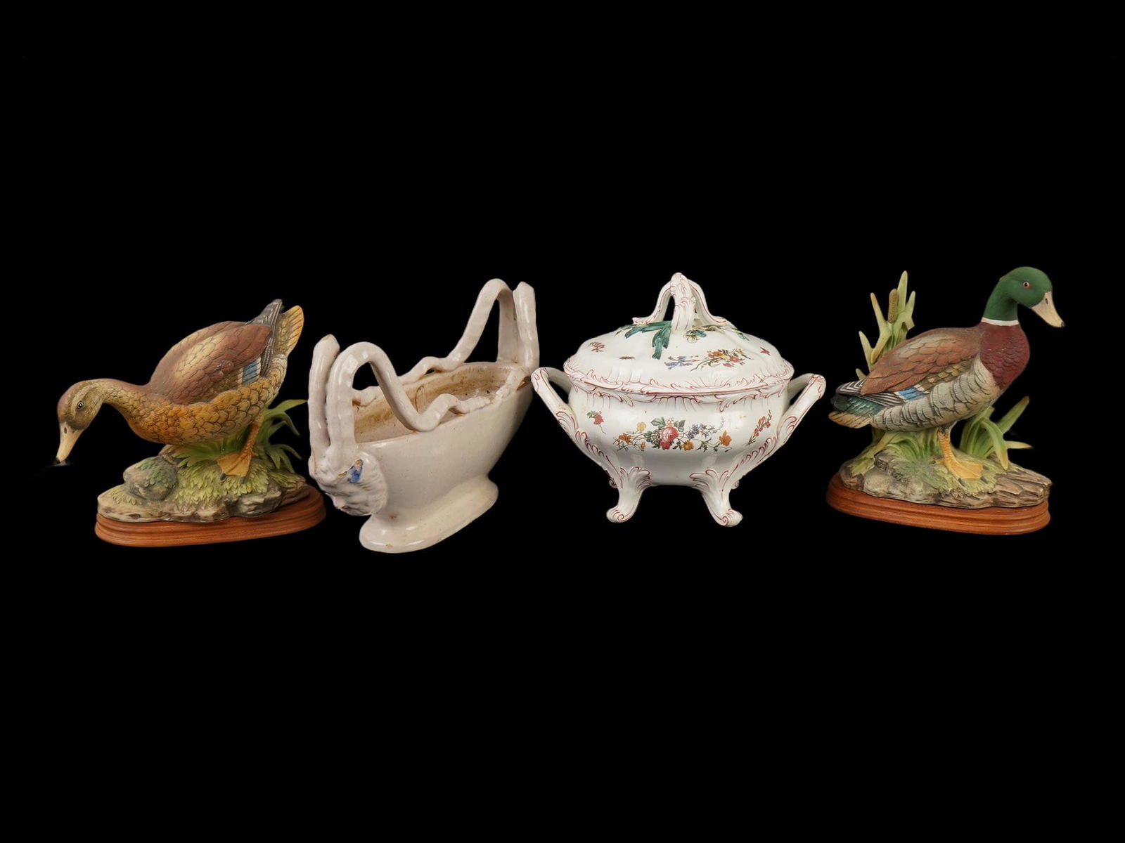 GROUP OF FOUR PORCELAIN AND CERAMIC ITEMS: A group of four porcelain and ceramic items including two porcelain duck figurines in the style of Andrea by Sadek, one white ceramic handled basket and one white lidded tureen adorned with floral
