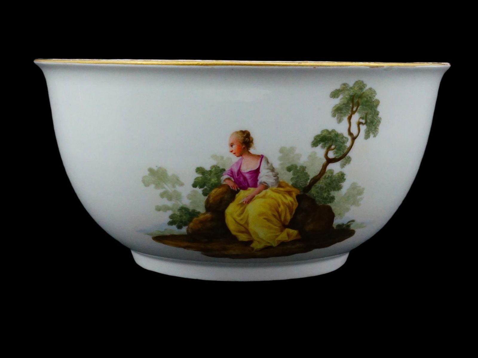 ANTIQUE MEISSEN PORCELAIN BOWL WATTEAUESQUE MANNER: An antique Meissen porcelain bowl, likely a teabowl or waste bowl, exemplifies the refined artistry of the Meissen during the Baroque and Academic periods, circa the late 18th century. Hand-painted