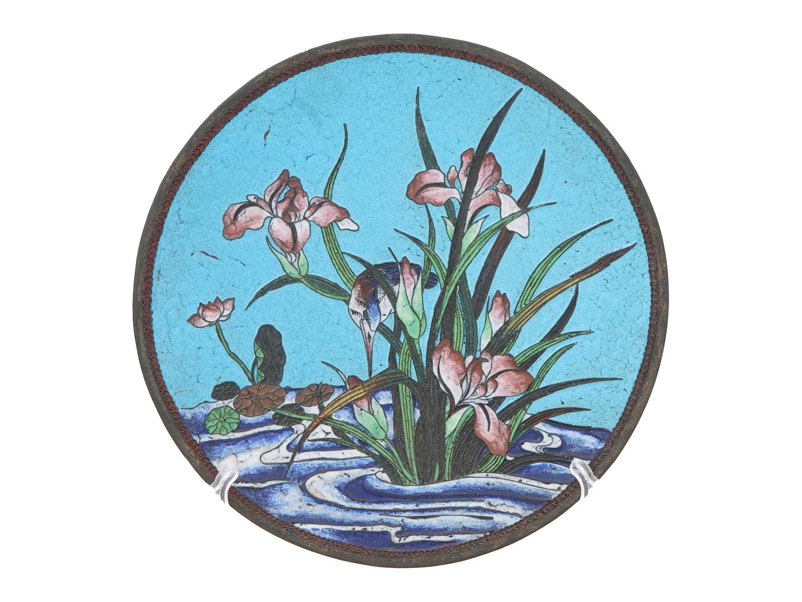 JAPANESE BIRD POLYCHROME CLOISONNE ENAMEL PLATE: A Japanese polychrome enamel plate. The plate is adorned with a polychrome enamel design representing a feeding bird in blossoming flowers made in the Cloisonne technique. The backside of the plate is