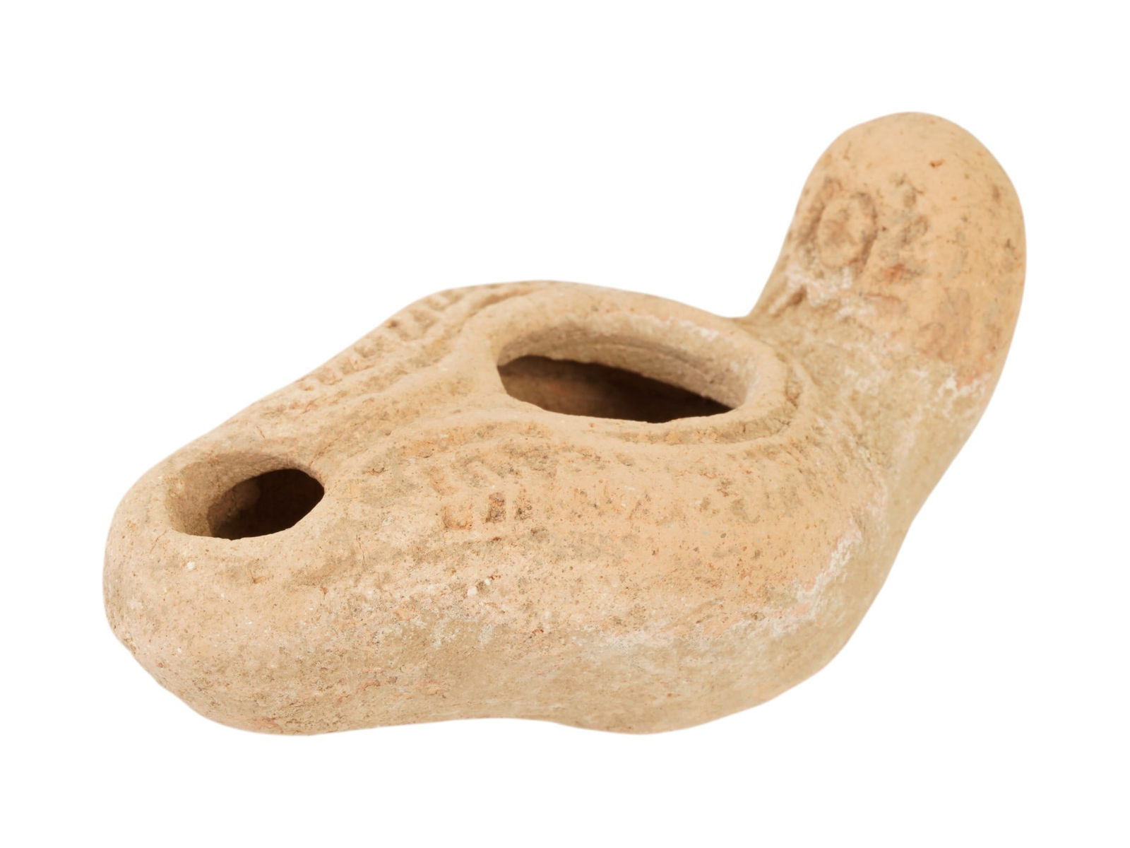 ANCIENT BYZANTINE TERRACOTTA OIL LAMP 350 TO 550 AD: An ancient Byzantine Empire terracotta pottery oil lamp. The lamp is decorated with a raised circle nozzle top and a raised handle. The body of the lamp is adorned with an embossed Sun design represen