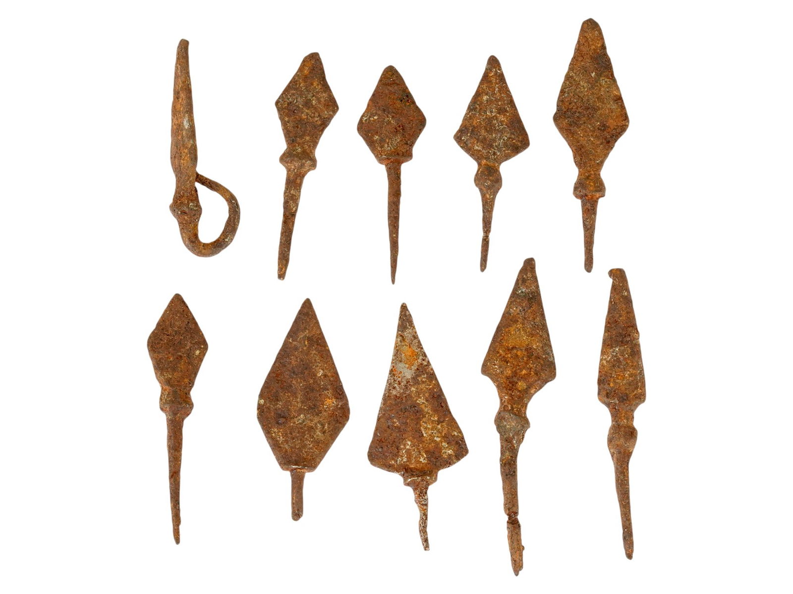 ANCIENT GREEK IRON ARROWHEADS CIRCA 500 TO 200 BC: A collection of 10 ancient Greek iron arrowheads, dating from 500 to 200 BC. This assortment features various designs, including prolonged, triangular, and rhombus-shaped forms, showcasing the evoluti