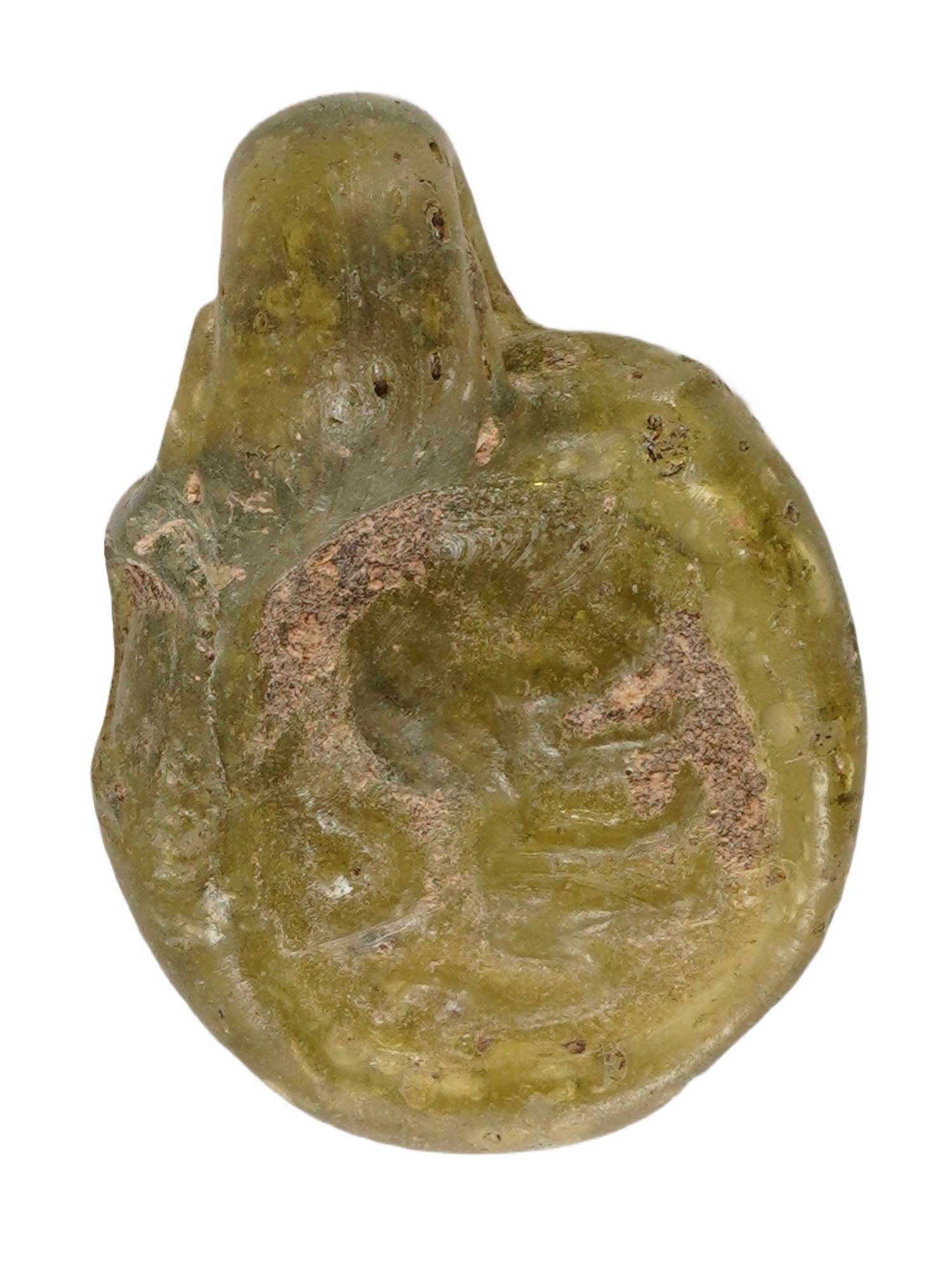 ANCIENT ROMAN GLASS PENDANT W LION 100 TO 300 AD: An ancient Roman astrological glass pendant dating circa 100 to 300 AD, featuring an image of a lion and a star in the field. The pendant reflects the widespread popularity of zodiac symbolism in the