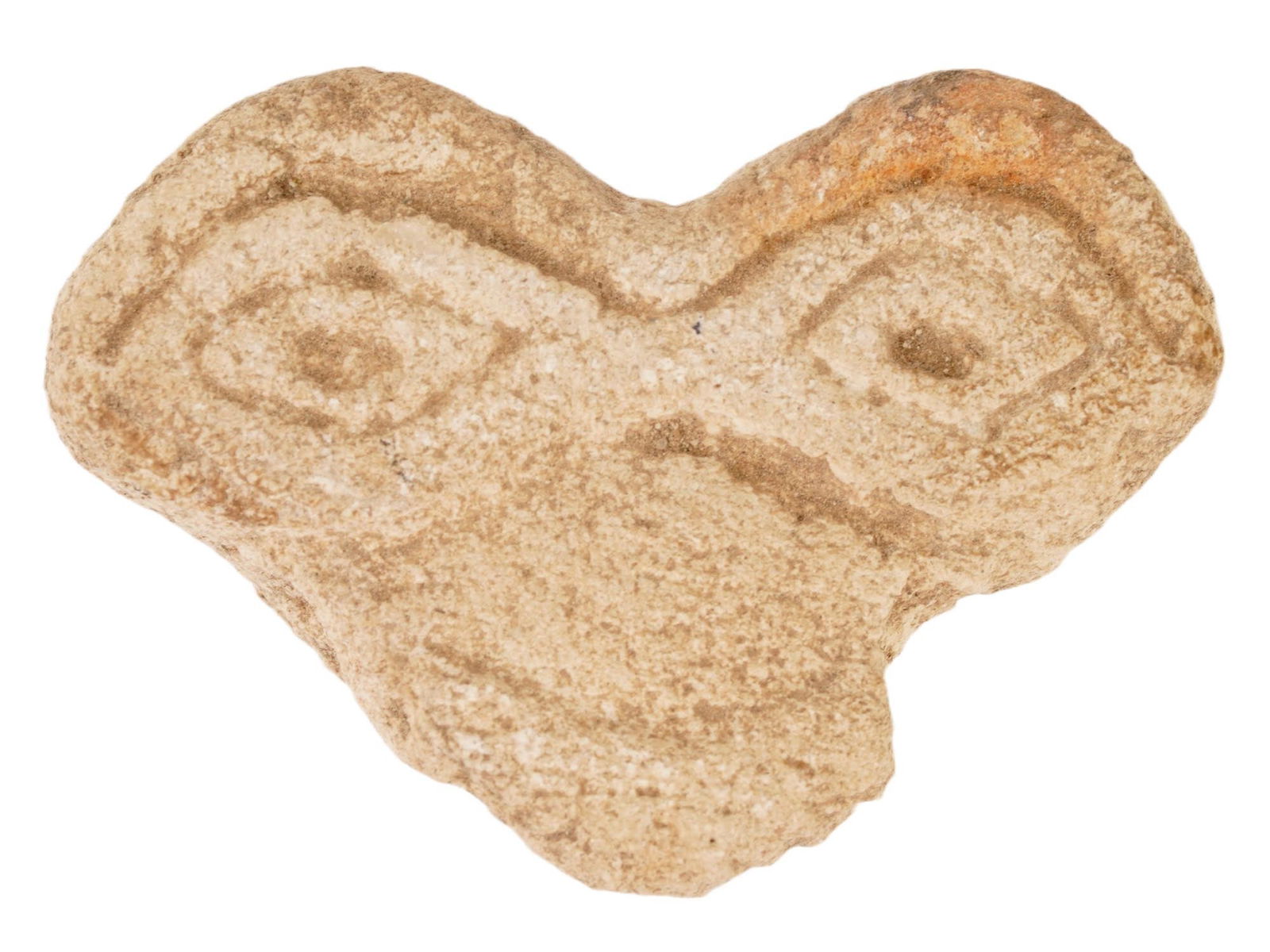 ANCIENT NEAR EASTERN STONE EYE IDOL FRAGMENT: An ancient Near Eastern stone eye idol fragment dating to the 3rd millennium BC and representing part of a stylized votive figure distinguished by its prominent, oversized eyes. Such idols are closely