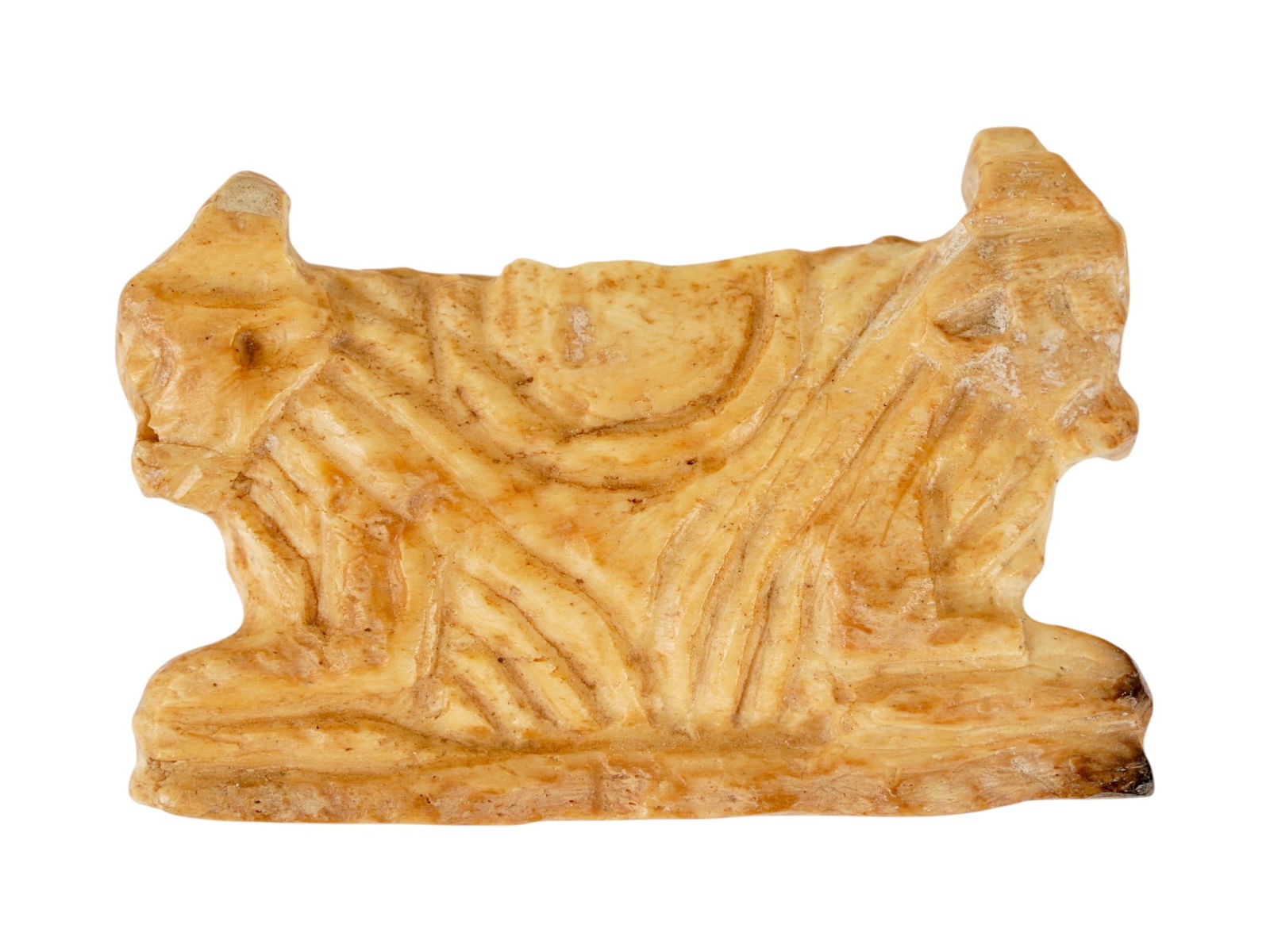 ANCIENT EGYPTIAN STONE DOUBLE HEADED BULL 700 TO 200 BC: An ancient Egyptian carved stone amulet depicting two bulls. This artifact dates back to the Egyptian culture of the Late Period, circa 700 to 200 BC. The object is a carved figurine depicting two sym