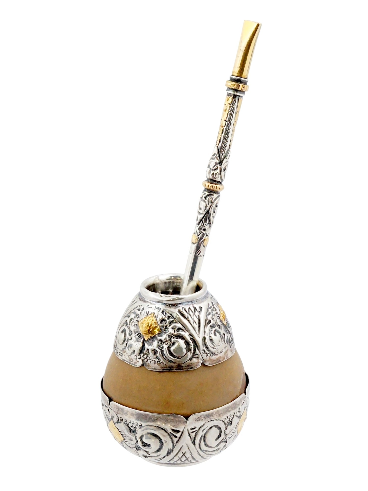 ARGENTINIAN YERBA MATE SILVER GOURD AND BOMBILLA SET: A vintage Argentinian yerba mate set featuring a calabash gourd and matching bombilla. The mate cup is adorned with chased silver with gilt accents, marked 900 silver. The bombilla, fitted with a filt