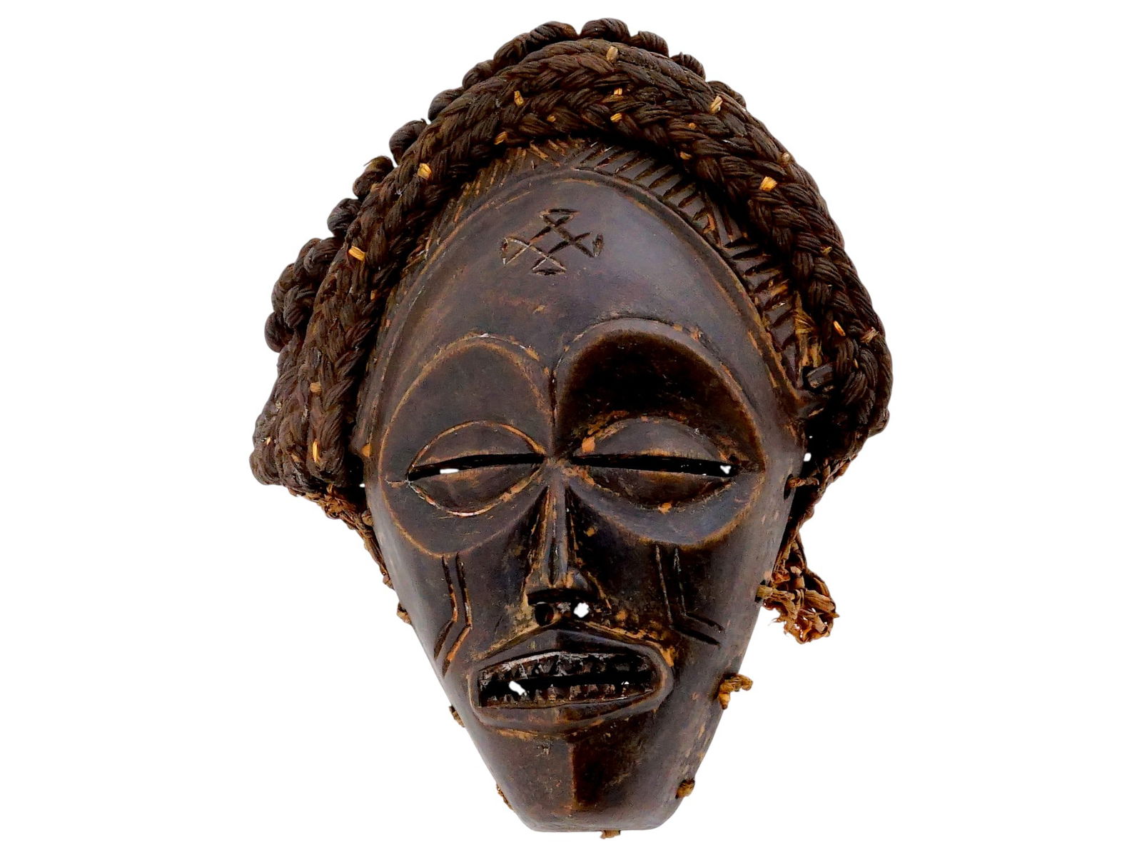AFRICAN CHOKWE PEOPLE MWANA PWO MASK: An African Mwana Pwo mask, a celebrated masterpiece of tribal art from the Chokwe people of Angola, the Democratic Republic of the Congo, and Zambia. Mwana Pwo translates to young woman. The mask