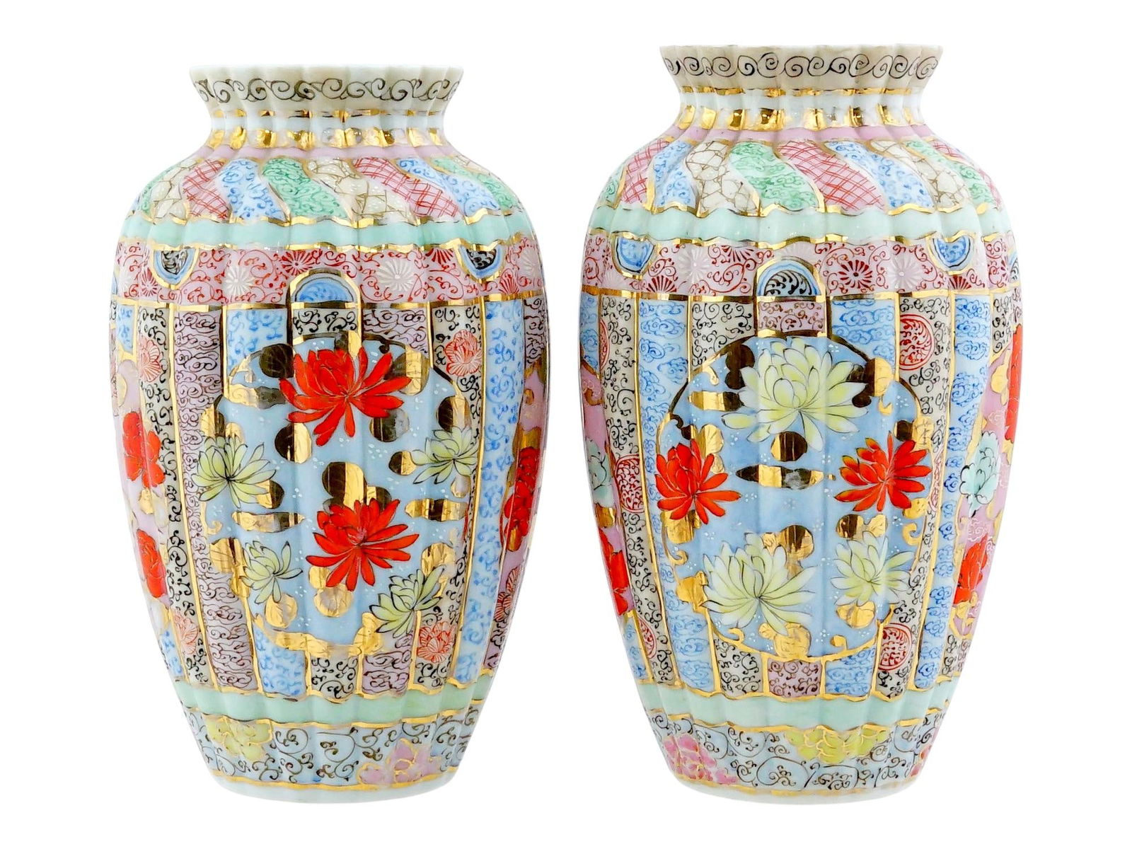 PAIR OF JAPANESE LOBED ENAMEL PORCELAIN VASES SIGNED: A pair of Japanese hand enameled porcelain vases. The vases have a classic baluster shape with a ribbed surface and a wavy edge of the neck. The surfaces of the vases are decorated with intricate