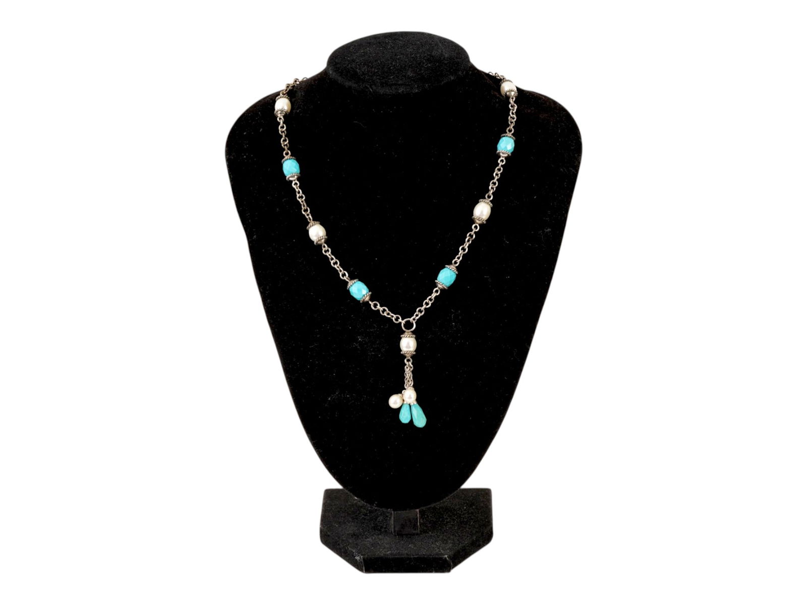 925 SILVER NECKLACE W FACETED TURQUOISE AND PEARLS: A sterling silver lariat-style necklace featuring barrel-shaped faceted turquoise beads and iridescent freshwater pearls accented by a multi-strand tassel drop. Marked with 925 sterling silver on the