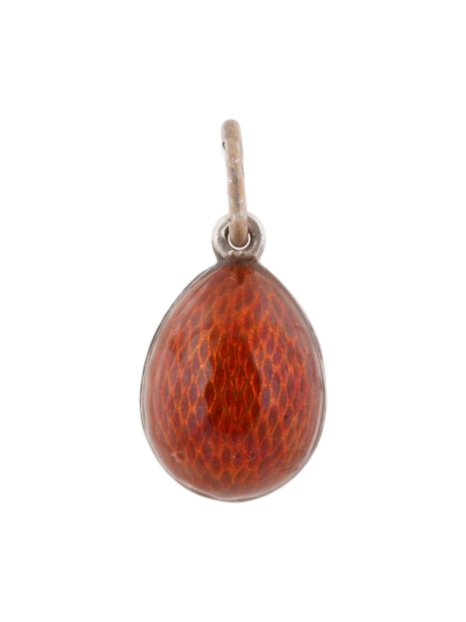 RUSSIAN SILVER GUILLOCHE ENAMEL EASTER EGG PENDANT: A Russian silver Easter egg pendant. The surface of the pendant is decorated with red guilloche enamel. The 84 silver standard hallmark and makers mark are on the suspension ring. Collectible Russian