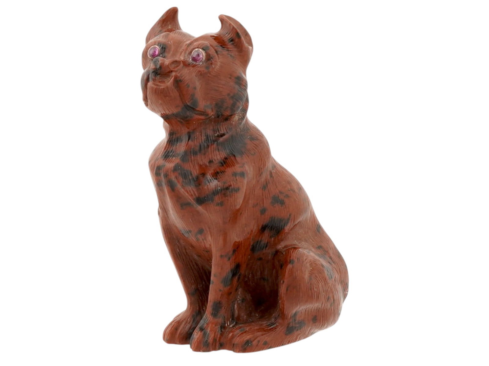 RUSSIAN OBSIDIAN RUBY GOLD BRITISH BULLDOG FIGURINE: A Russian carved obsidian figure of a British bulldog sitting on its hind legs with ruby stone eyes set in gold mounts. Russian Carvings And Animal Figurines For Collectors. Total weight: 34.4 g.