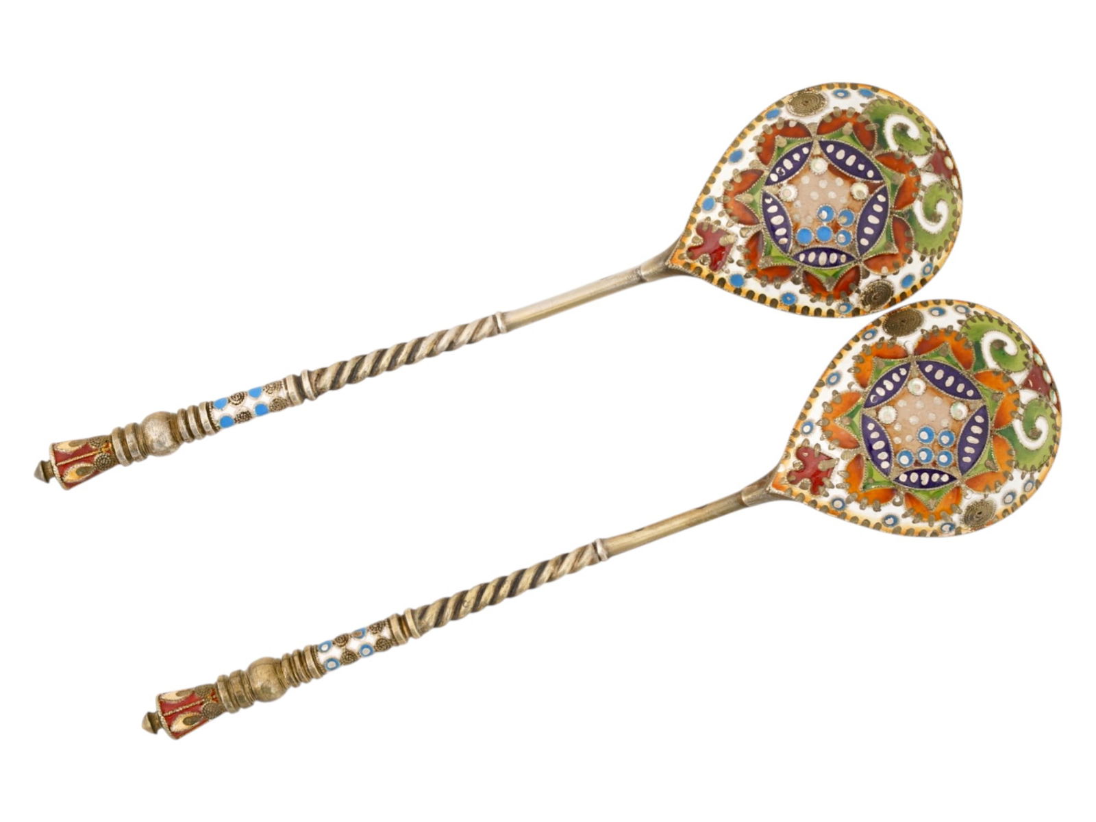 RUSSIAN GILT SILVER CLOISONNE ENAMEL TEA SPOON SET: A Russian set of two 88 gilt silver and enamel tea spoons. Each spoon is adorned with a twisted handle design, polychrome cloisonne enamel decoration on the handle tip and backside of the bowl. The
