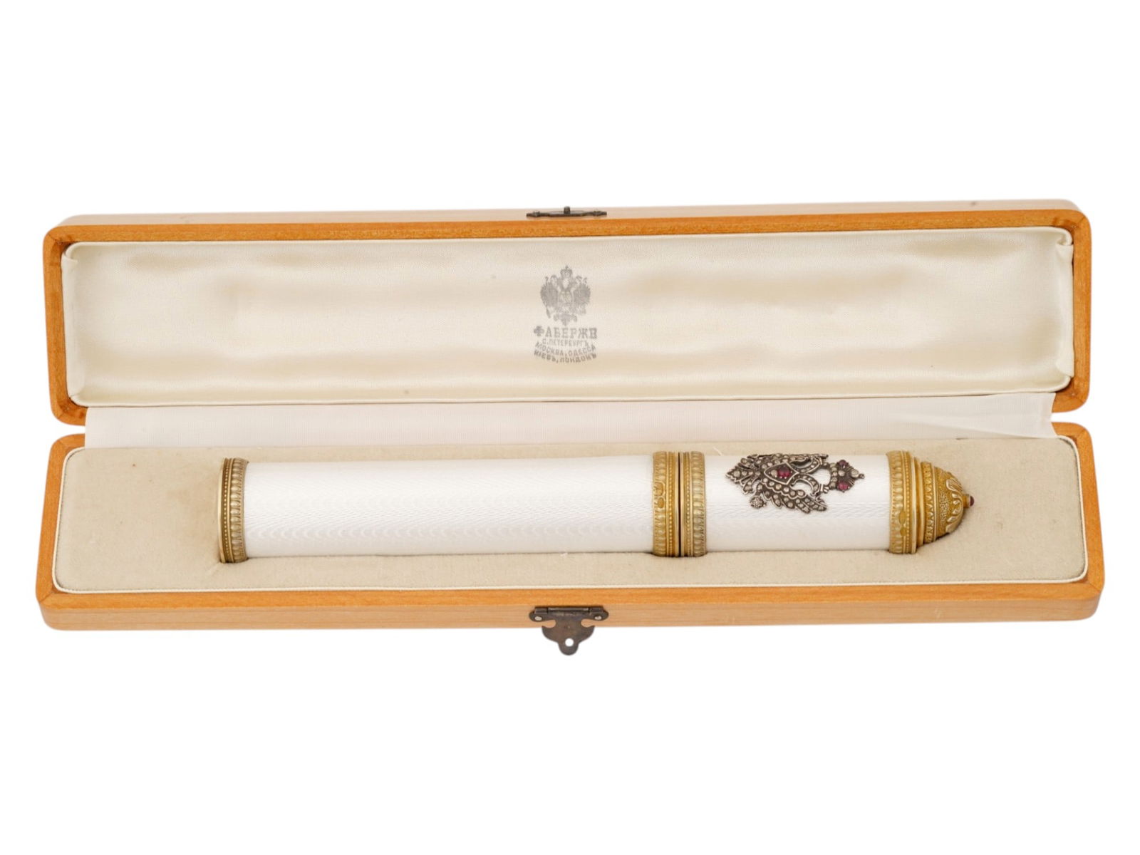 RUSSIAN SILVER ENAMEL CIGAR CASE W DIAMONDS AND GEMS IN BOX: A Russian gilt silver cigar case decorated with white guilloche enamel, featuring an overlay decor of Imperial double-headed eagle emblem adorned with diamonds and gemstones. The top is adorned with