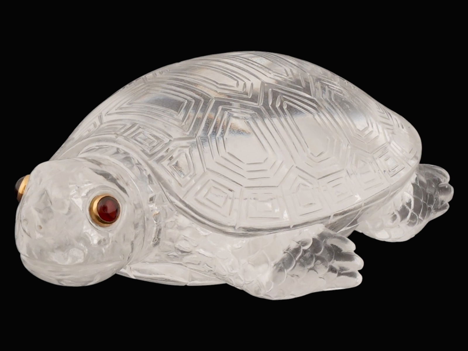 RUSSIAN ROCK CRYSTAL TURTLE FIGURINE W GOLD GEMSTONE EYES: A Russian carved rock crystal turtle figurine, featuring a detailed hexagonal shell pattern and gold-rimmed cabochon gemstone eyes. Collectible Imperial Russian Gold And Crystal Jewelry And Decor.