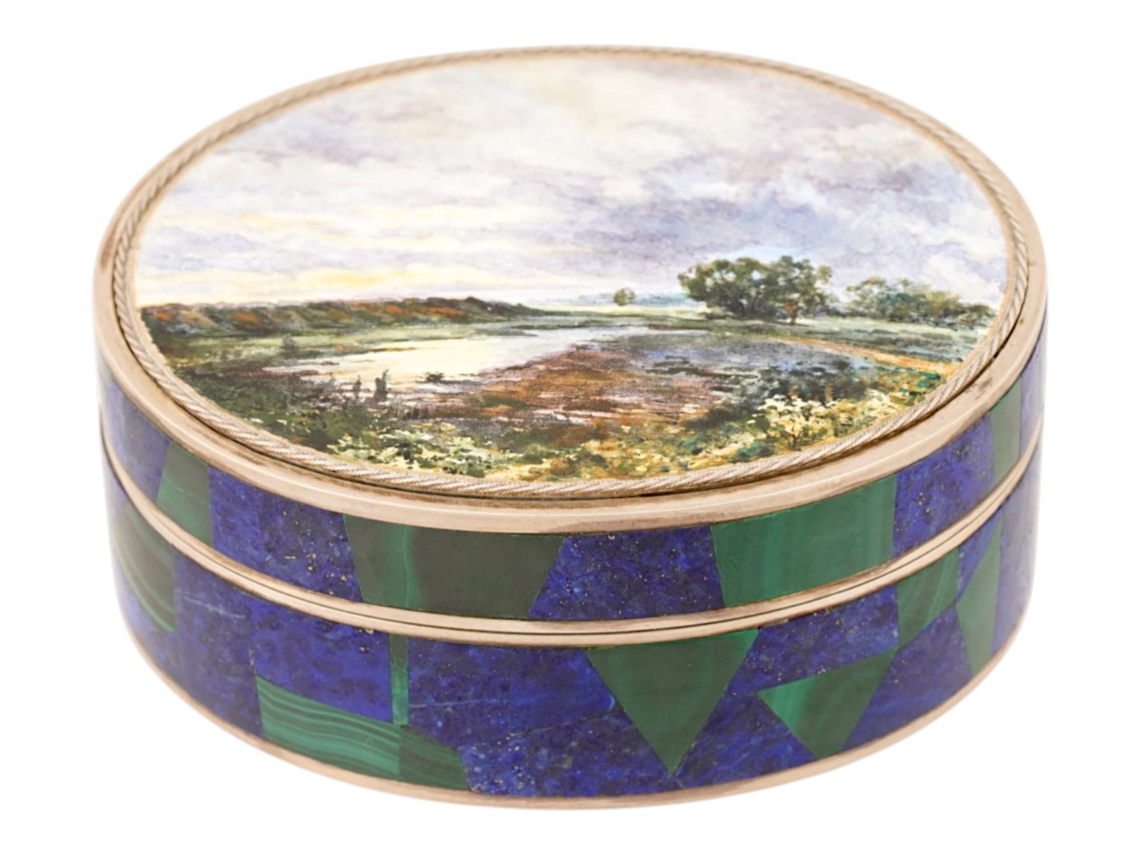 RUSSIAN GILT SILVER ENAMEL LAPIS LAZULI MALACHITE BOX: A Russian gilt silver oval-shaped box with a hinged lid, showcasing an enamel painting of a traditional Russian landscape with a river. The box is adorned with encrusted lapis lazuli and malachite