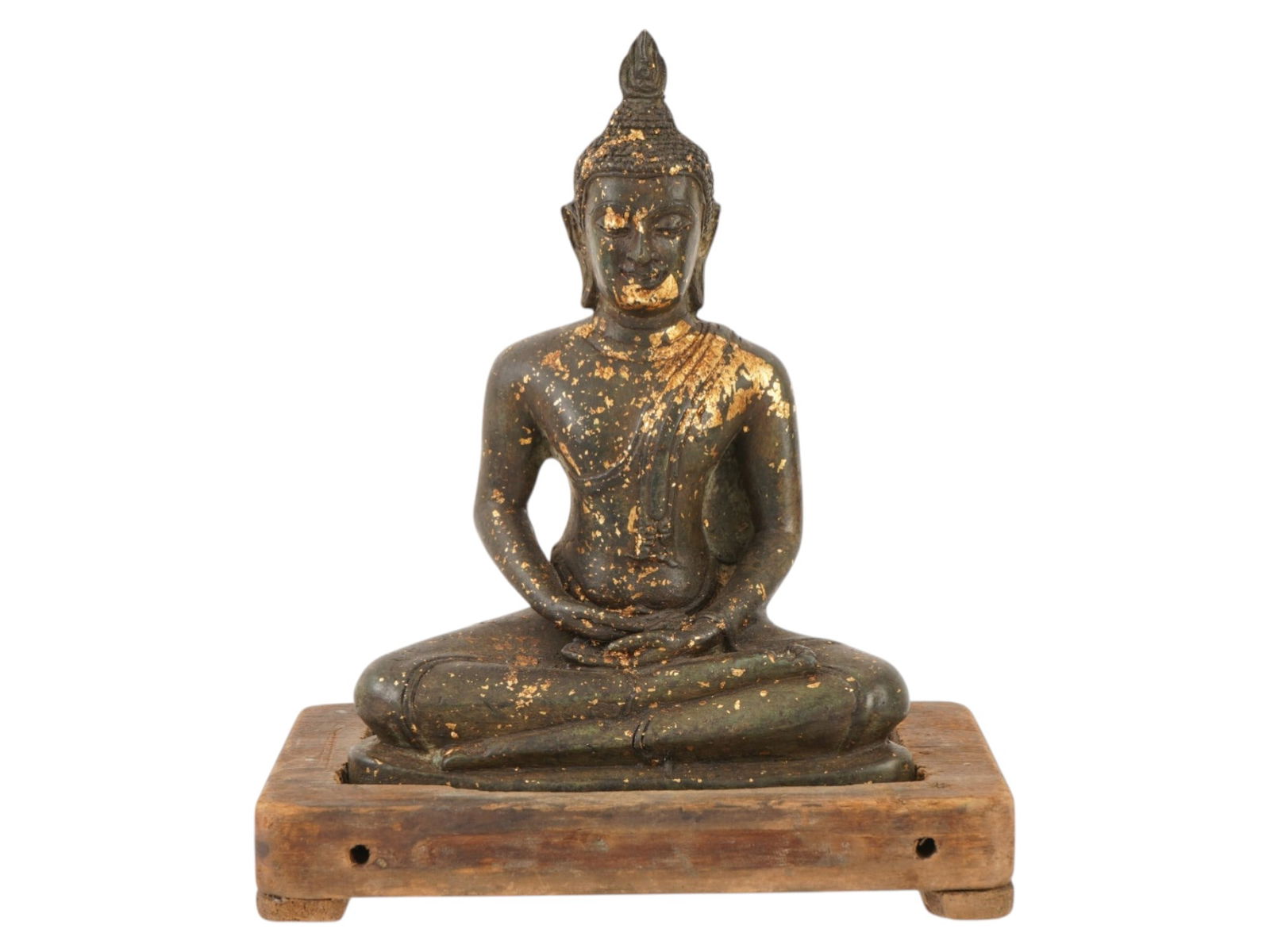 ANTIQUE 19TH CEN ASIAN GILDED CAST BRASS BUDDHA STATUE: An antique 19th century Asian dark patinated and gilded cast brass statue of Buddha. The statue depicts Shakyamuni Buddha in a meditative posture, mounted on a wooden stand. The figure is adorned with