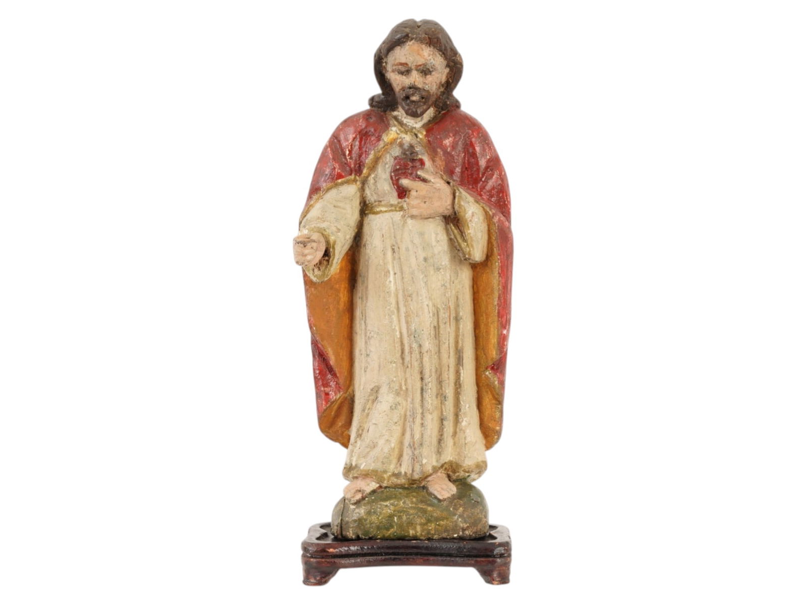19TH C CARVED WOOD FIGURINE OF SACRED HEART JESUS: A 19th century hand carved wood figurine of The Sacred Heart of Jesus, a popular Catholic iconographic image symbolizing Christs boundless and sacrificial love for humanity. Jesus is depicted full len