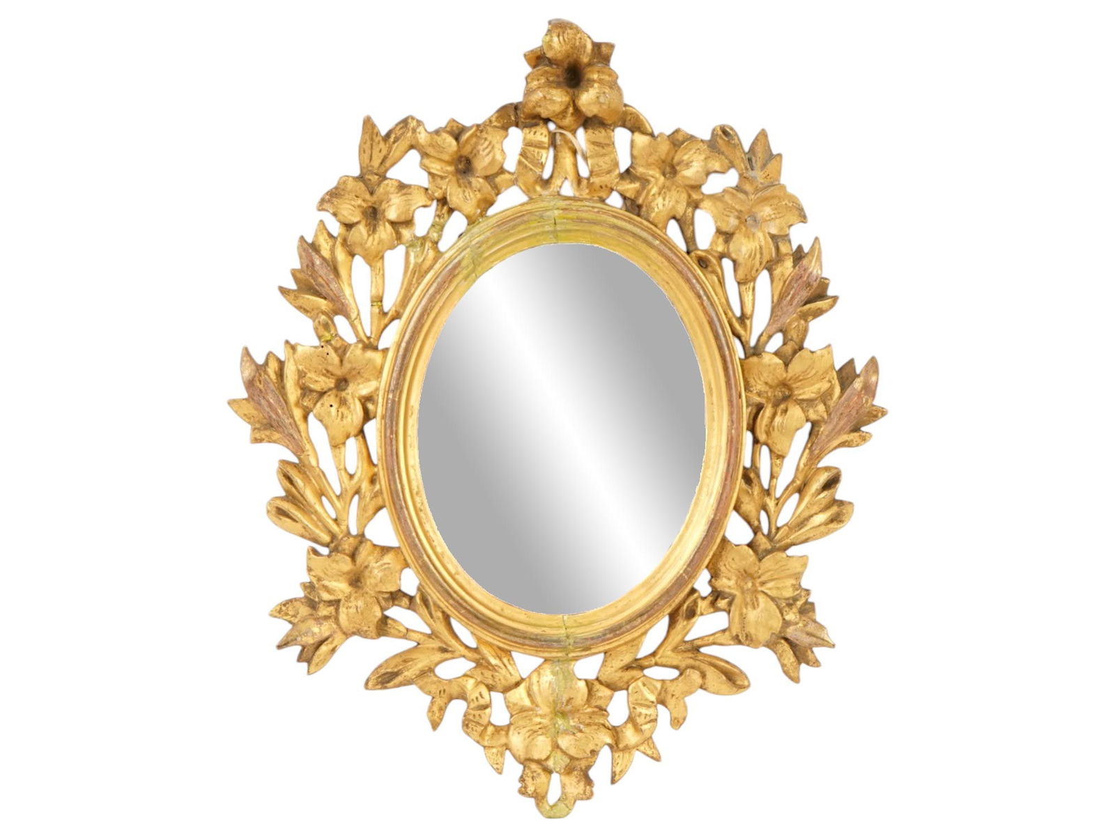 ANTIQUE 19TH C CARVED AND GILDED WOODEN FLORAL MIRROR: An antique 19th-century carved and gilded wooden frame with mirror surface. It features an ornate oval frame characterized by openwork floral and foliate motifs. The design is consistent with the Loui
