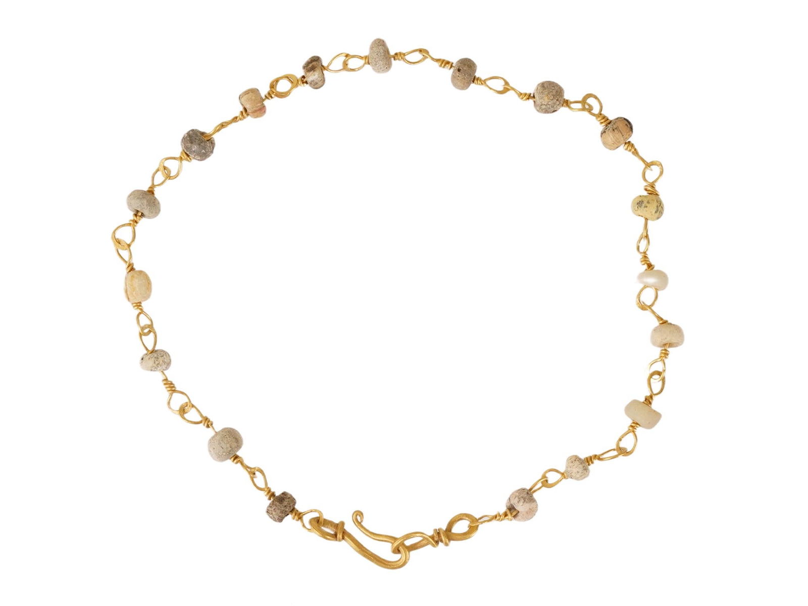 ANCIENT ROMAN HIGH CARAT GOLD AND GLASS BEADED BRACELET: An ancient Roman bracelet, dating circa 100 to 300 AD. Composed of high-carat gold elements and glass beads, reflecting the refined jewelry traditions of the Roman world. Ancient Artifacts And Histori