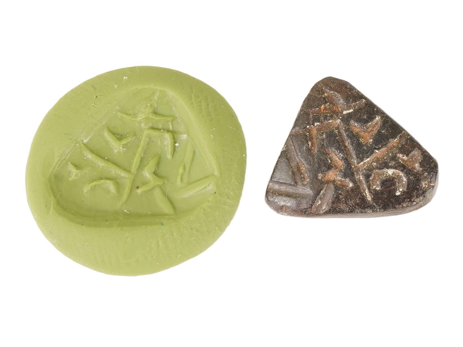 ANCIENT HOLY LAND INSCRIBED STEATITE STAMP SEAL: An ancient inscribed steatite stamp seal from the Holy Land, dating circa 800 to 400 BC, featuring a carved example of Near Eastern glyptic art. Crafted from soft steatite, the seal bears an engraved