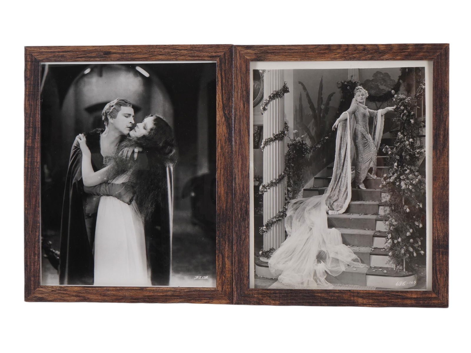LOT OF VINTAGE BW PHOTOS OF HOLLYWOOD MUTE MOVIES: A lot of two classic black and white photographs from the silent film era, framed in a wooden frame. The first photo depicts John Barrymore and Mary Astor in a scene from Don Juan. This film, released