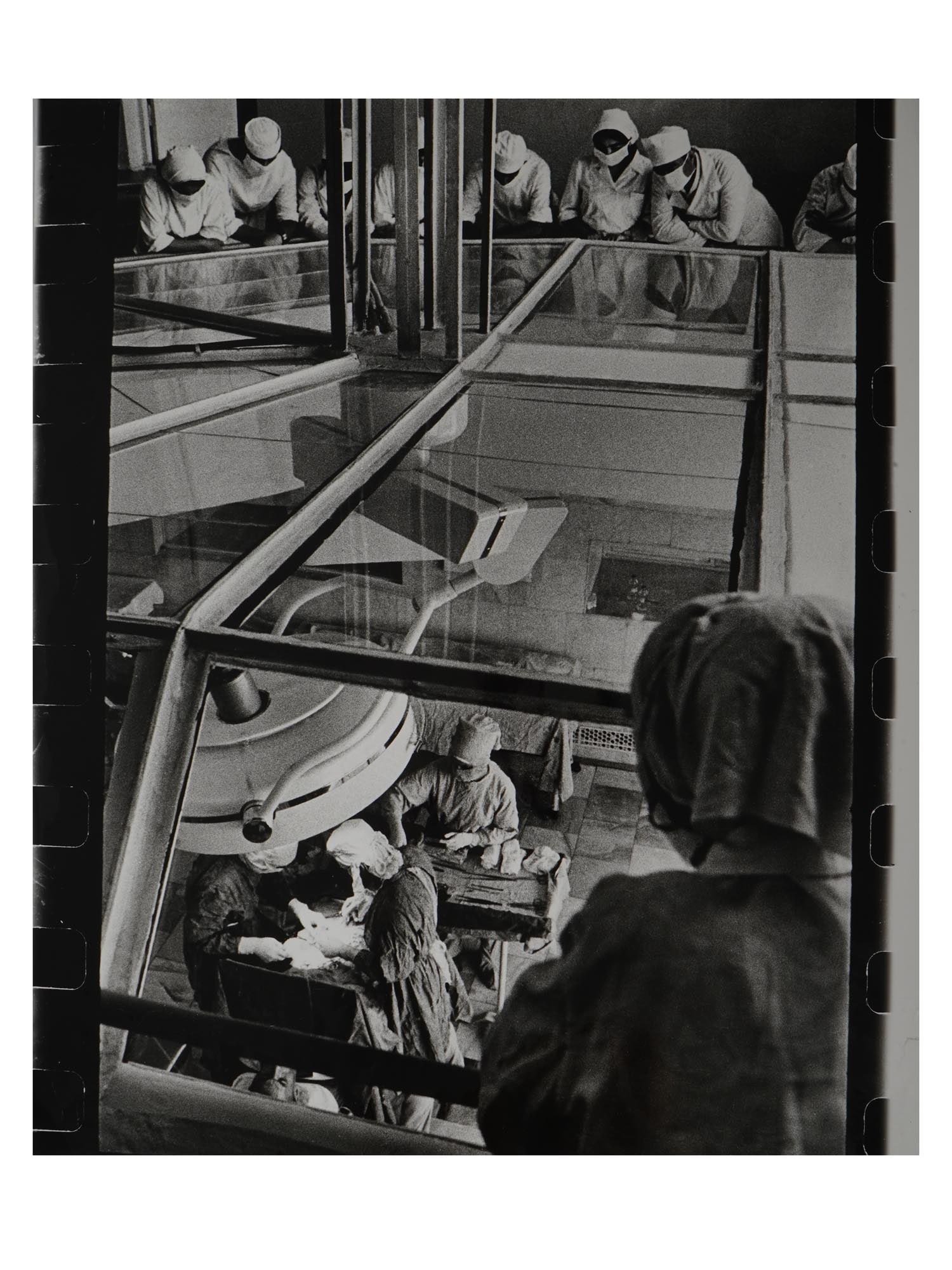 RUSSIAN SOVIET GEORGY ZELMA SURGICAL OPERATION PHOTO: A vintage Russian Soviet Surgical Operation photograph by Georgy Zelma. The reportage photograph shows a surgical operation in a medical institution, which is observed by doctors and medical students.