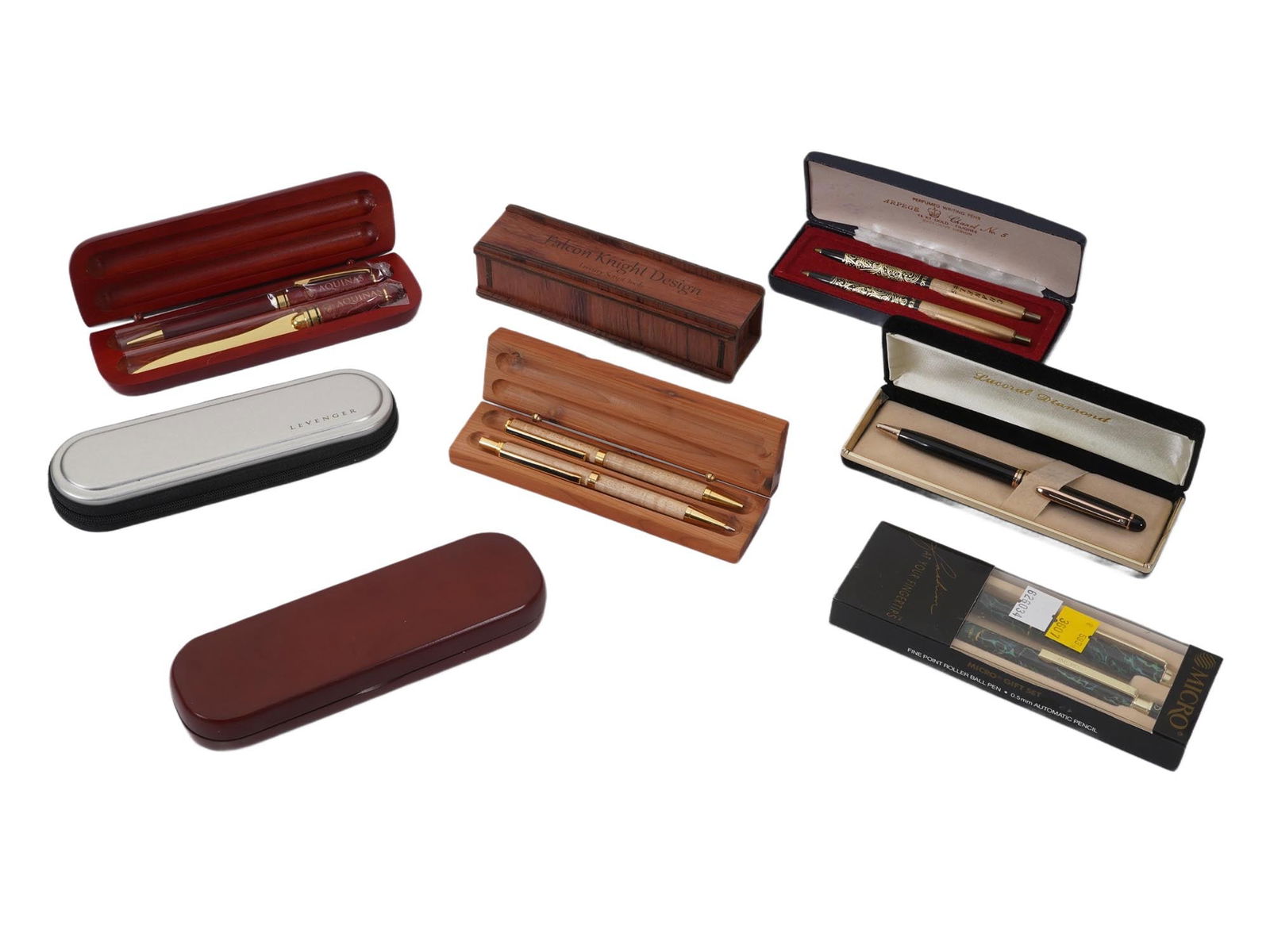 COLLECTION OF BOXED GIFT SETS OF PENS AND PENCILS: A collection of boxed gift sets of pens and pencils in various finishes and styles. ISome are inscribed: Aquinas Institute of Rochester, Levenger, Micro, Falcon Knight Design. Collectible Luxury Pens