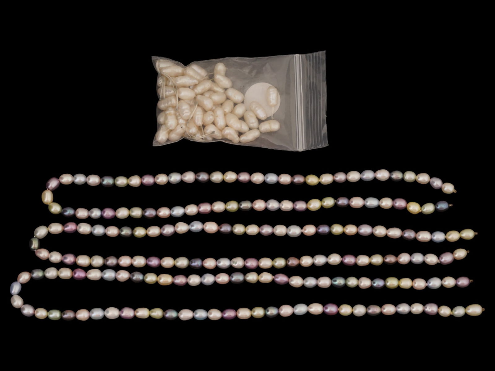 COLLECTION OF RIVER PEARLS WITH THREE NECKLACES: A collection of river pearls including three strings of necklaces. Vintage and Modern Natural Stones, Necklaces, Jewelry, Gifts And Accessories For Women. Total weight 96.6. THIS LOT IS ELIGIBLE FOR