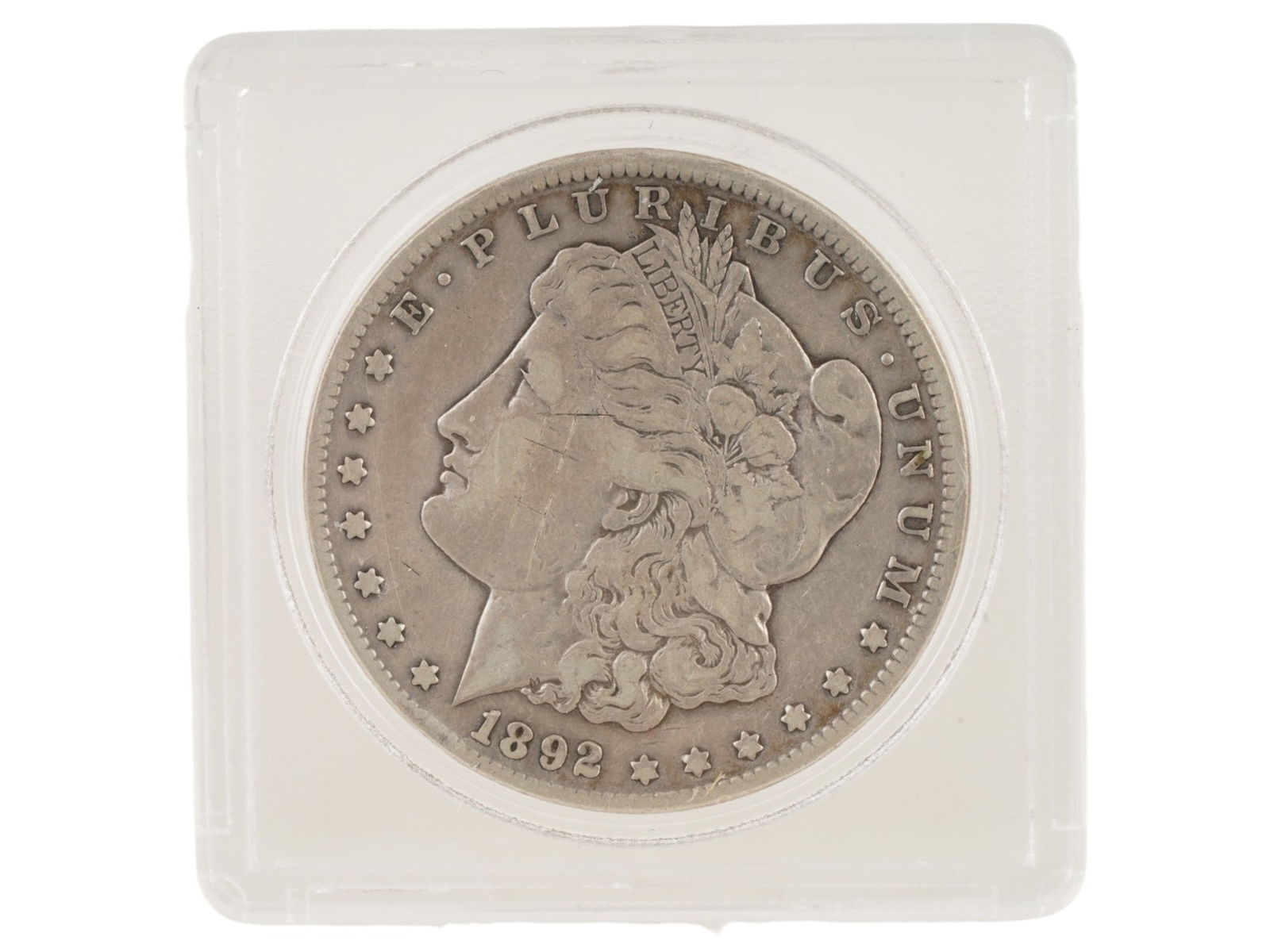 ANTIQUE 1892 AMERICAN CARSON CITY MORGAN SILVER DOLLAR: An antique 1892 American Morgan 90 percent silver dollar coin. CC XF AU Condition, KEY DATE, DIRTY TONER. Low Mintage 2nd to last year of the Carson city Morgan mintage. Named after its designer,