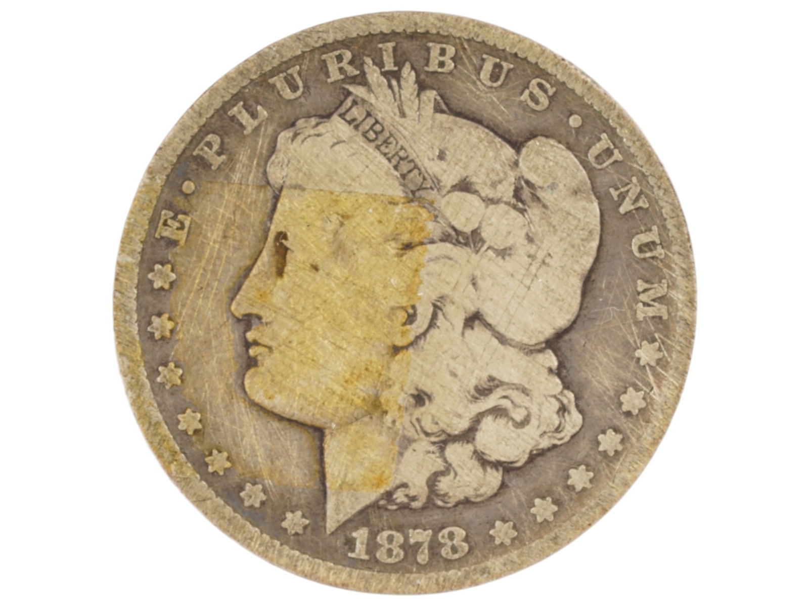 1878 CC MORGAN SILVER DOLLAR TONER 1ST YEAR OF ISSUE: A 1878-CC Morgan Silver Dollar coin featuring a highly collectible first-year issue struck by the United States Mint at the historic Carson City Mint. Composed of 90% silver, the coin shows the