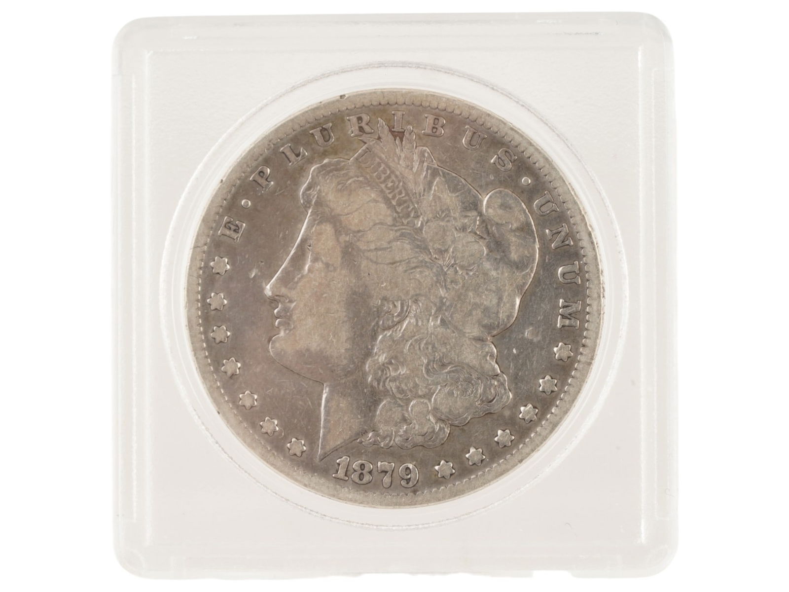 1879 S MORGAN SILVER DOLLAR COIN TONER: A 1879-S Morgan Silver Dollar coin featuring a classic 90% silver coin struck by the United States Mint at the San Francisco Mint. With the iconic Liberty portrait on the obverse and heraldic eagle on