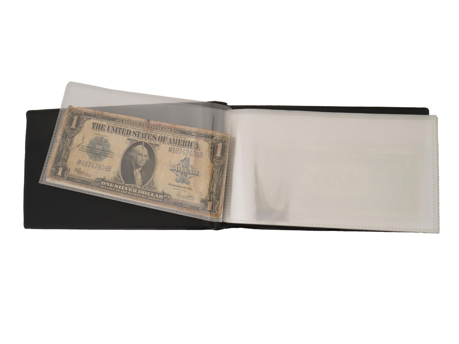 BANKNOTE COLLECTING ALBUM WITH PAPER MONEY: A currency binder, banknote collecting album with protective transparent sleeves. The album contains banknotes from the United States and other countries. Paper Money, Currency Collectibles. TH