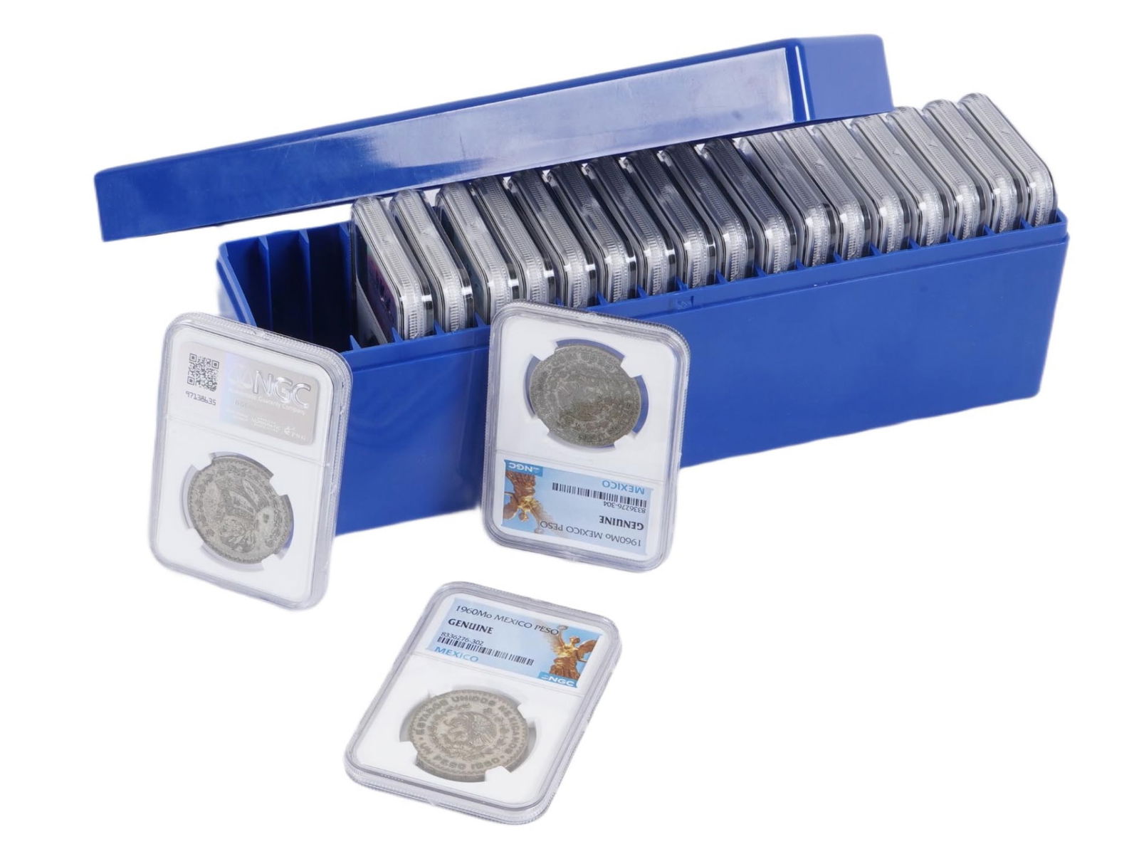 1966 MEXICAN 1 PESO MS 65 NGC GRADED SILVER COINS: A collection of 20 NGC-graded coins, each preserved in protective plastic slabs. The group includes multiple Mexican 1 Peso silver coins dated 1966, struck at the Mexico City Mint and composed of silv