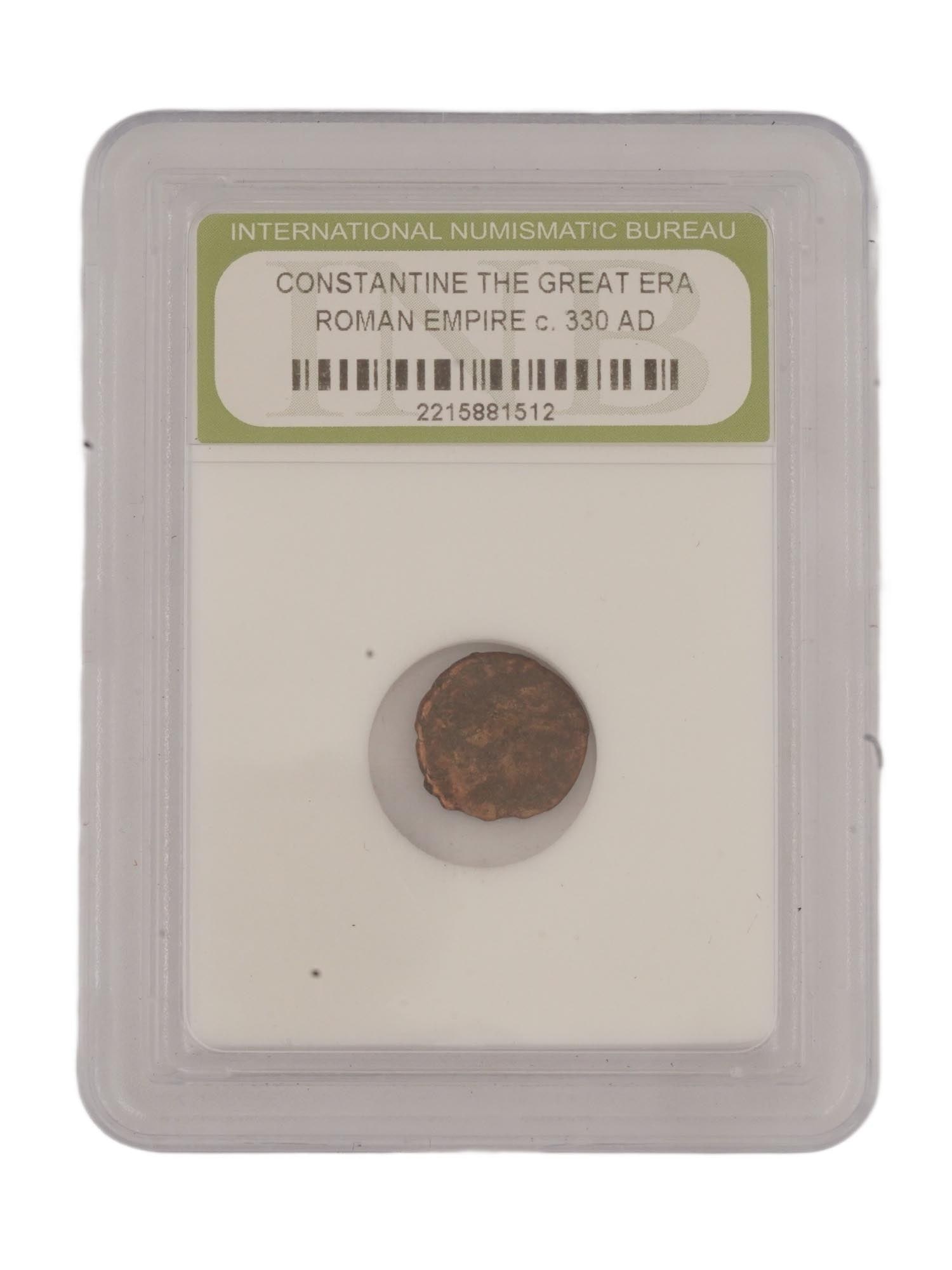 ANCIENT ROMAN CONSTANTINE THE GREAT GRADED COIN CA 330 AD: An ancient Roman Empire Constantine The Great coin, circa 330 AD. Encased in an International Numismatic Bureau protective plastic holder. Ancient Palestinian Collectible Numismatics And Exonumia.