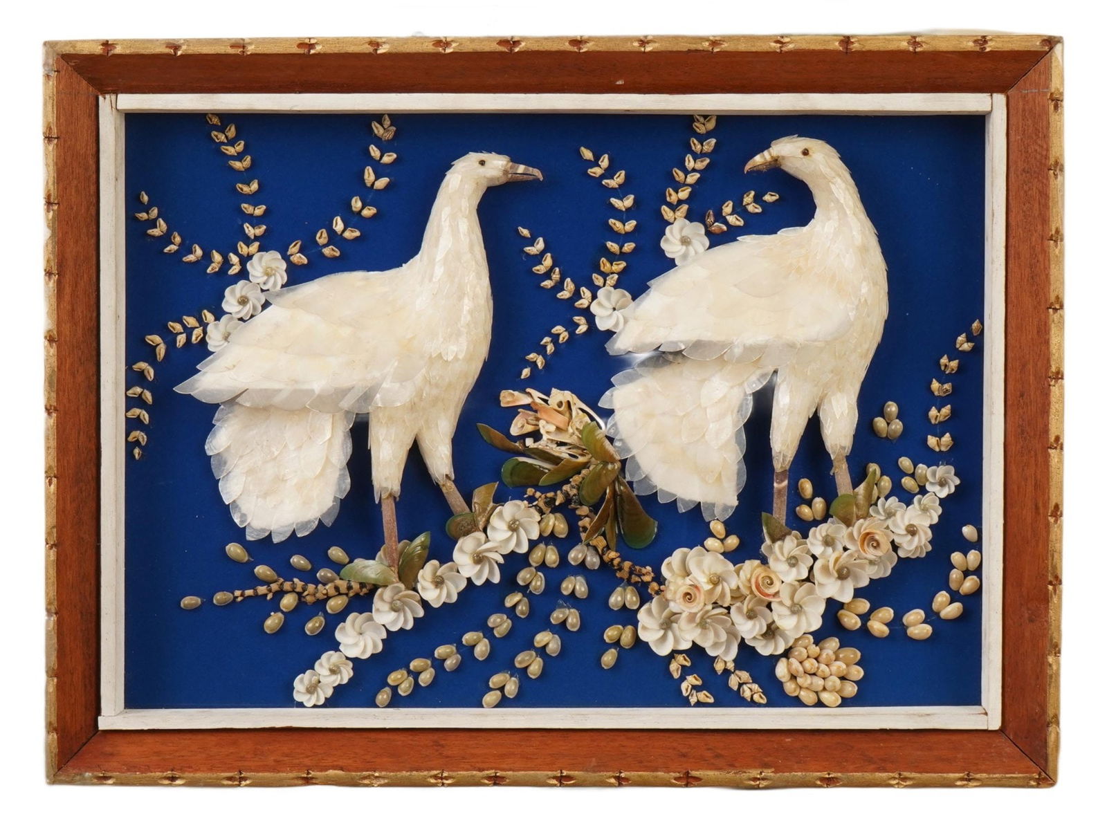 VINTAGE SHELL AND MOTHER OF PEARL MOSAIC ARTWORK: A vintage three-dimensional assemblage or mosaic artwork made entirely from natural materials, primarily sea shells and pieces of mother-of-pearl. The art is crafted using various types and sizes of n