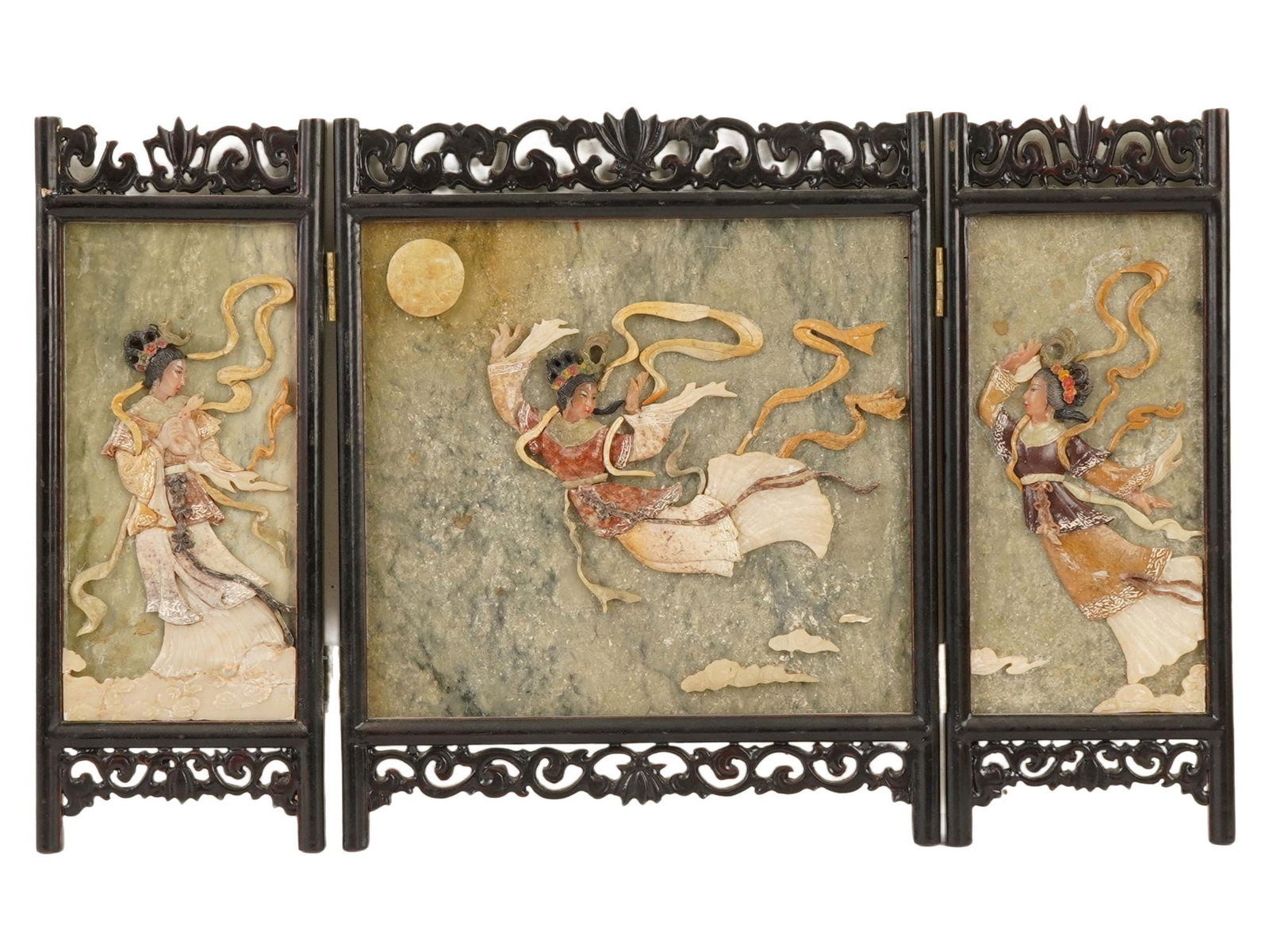 VINTAGE CHINESE WOODEN AND CARVED HARDSTONE SCREEN: A vintage Chinese wooden and carved hardstone screen, featuring celestial figures or immortals depicted in dynamic, floating poses within a stylized landscape. The three-panel folding screen is