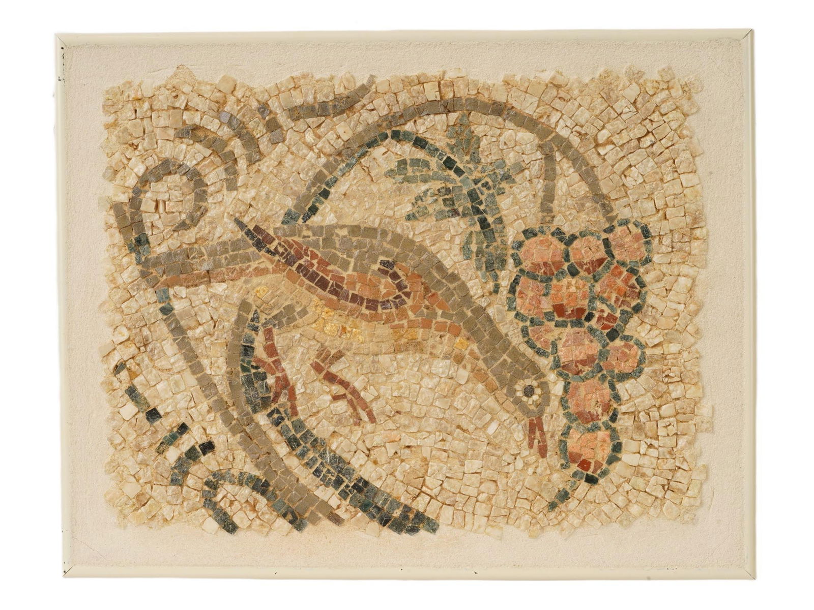 ANCIENT ROMAN BIRD GRAPES STONE MOSAIC 100 TO 300 AD: An ancient Roman mosaic artwork composed of tesserae pieces dating circa 100 to 300 AD. The mosaic depicts a composition with a bird and a grape vine. Mosaics such as this were often used to adorn the