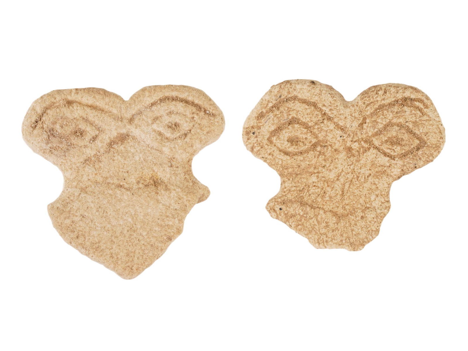 ANCIENT WEST ASIATIC STONE EYE IDOL 2ND MILLENIUM BC: A lot of two ancient Western Asiatic carved stone eye idol sculptural fragments. Shaped like a weight surmounted by two eyes, much scholarly design has been proposed about their meanings. These so cal