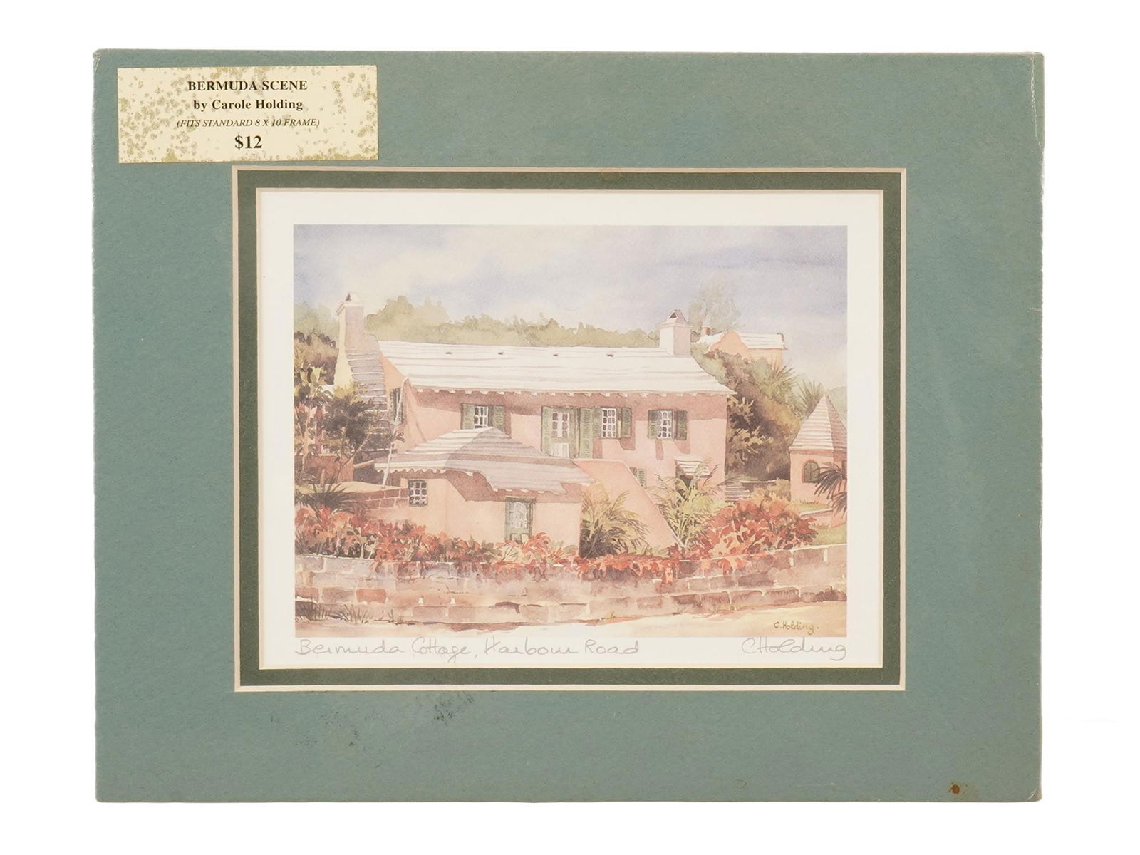 BERMUDA COTTAHE COLOR PRINT BY CAROLE HOLDING SIGNED: Carole Holding, Australian, an offset lithograph on paper, Bermuda Cottage, Harbour Road. Signed in the print and in pencil, lower right. Titled in pencil, lower left. Matted, A printed information