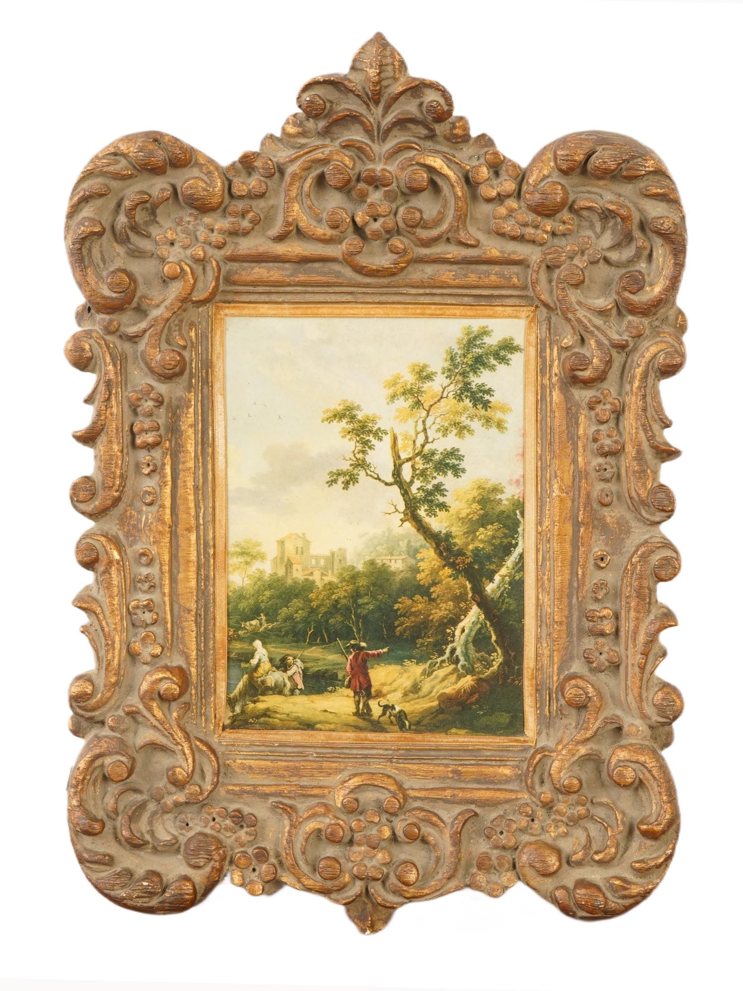 VTG PRINT OF LANDSCAPE HUNTING SCENE W ORNATE FRAME: A vintage print depicting a landscape painting, set by an ornate frame. The scene depicts a pastoral European landscape with a hunter and a dog. The frame is highly decorative, featuring Rococo or Bar