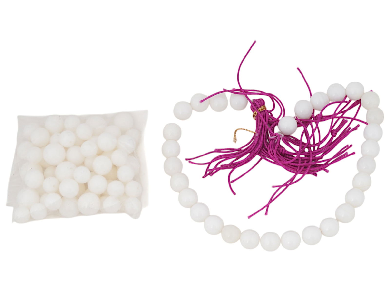 LARGE LOT OF VINTAGE WHITE PLASTIC BEADS: A set of white plastic beads with glossy finish. The lot also features a pink string tassel. Beaded Jewelry, DIY Supplies. THIS LOT IS ELIGIBLE FOR A 30-DAY UNCONDITIONAL RETURN FROM THE DATE